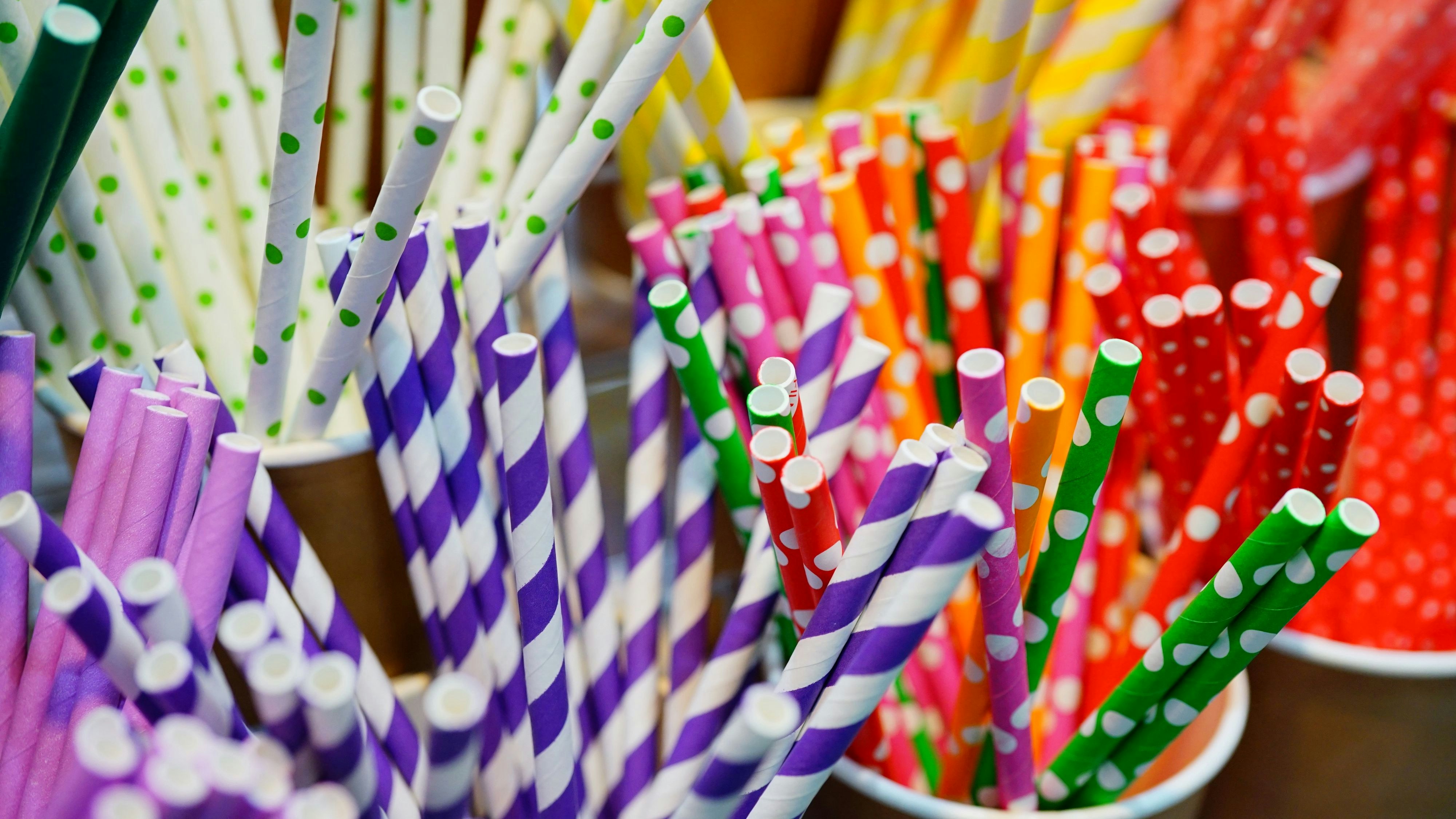 Close-up Colorful paper tubes for drinks backgrounds