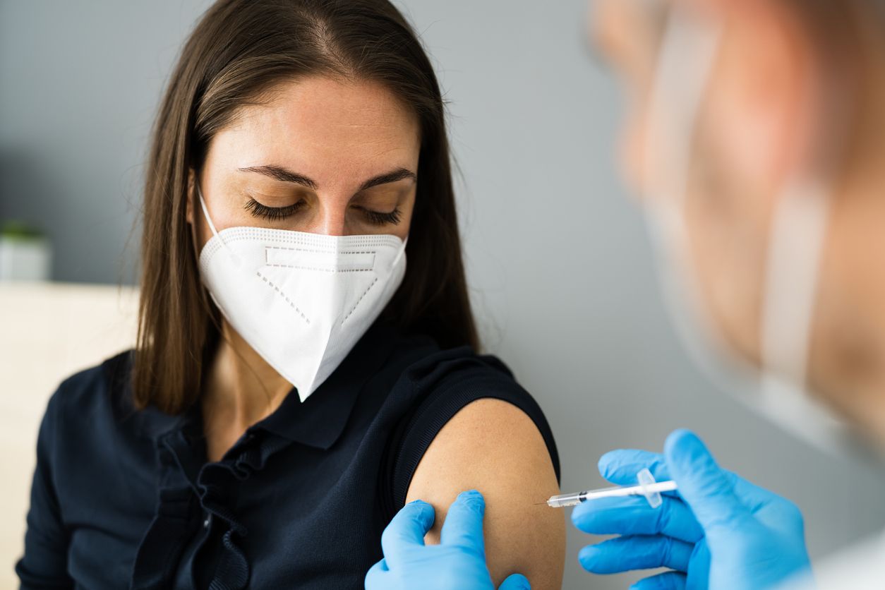 Covid Vaccine Injection By Doctor In Face Mask