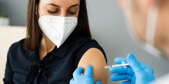 Covid Vaccine Injection By Doctor In Face Mask