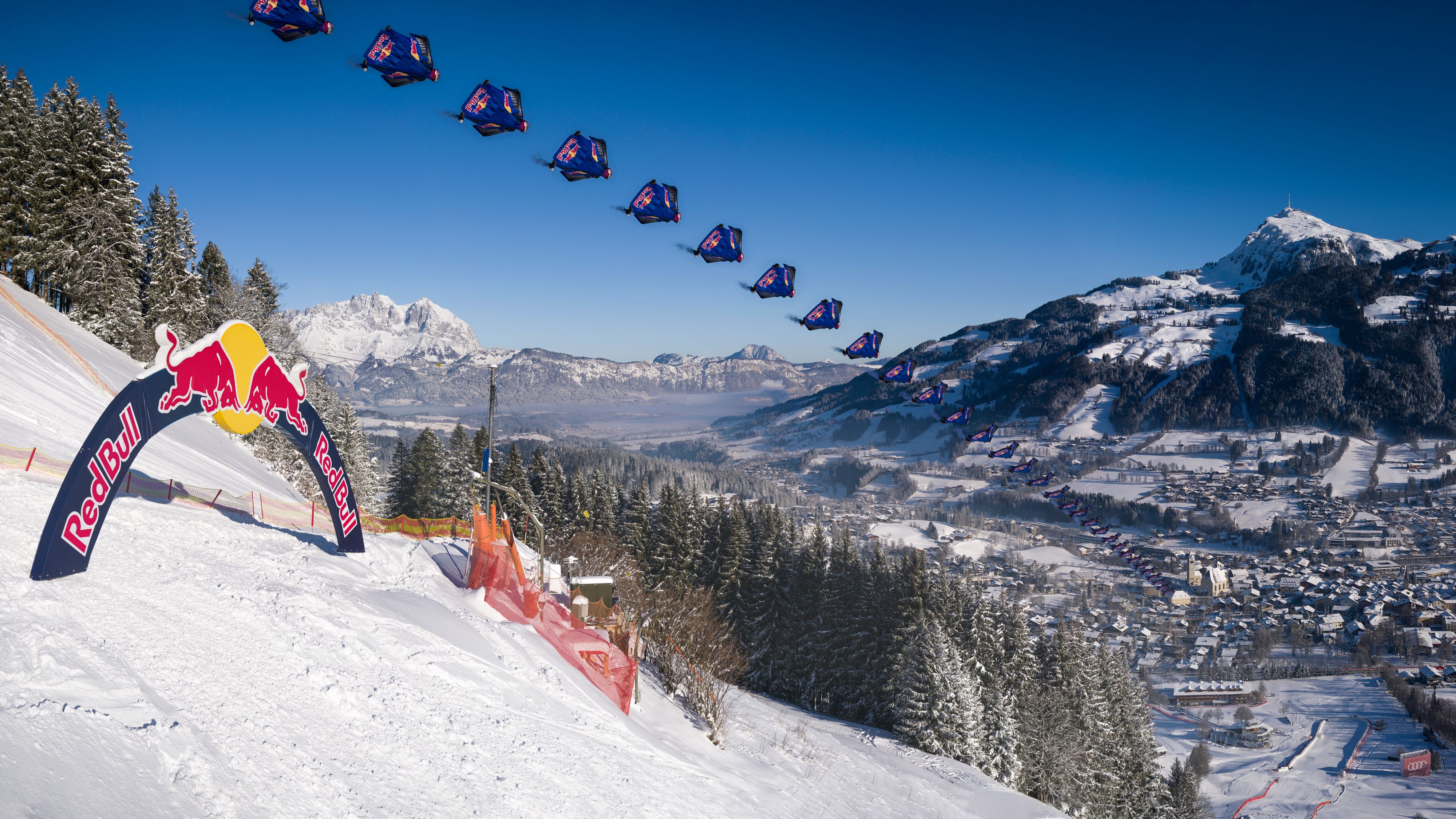 Marco Waltenspiel of the Red Bull Skydive Team conquers the famous Streif with his wingsuite at Kitzbuehel, Austria on January 15, 2021. Editors Note: This image is a composite of several single images. 