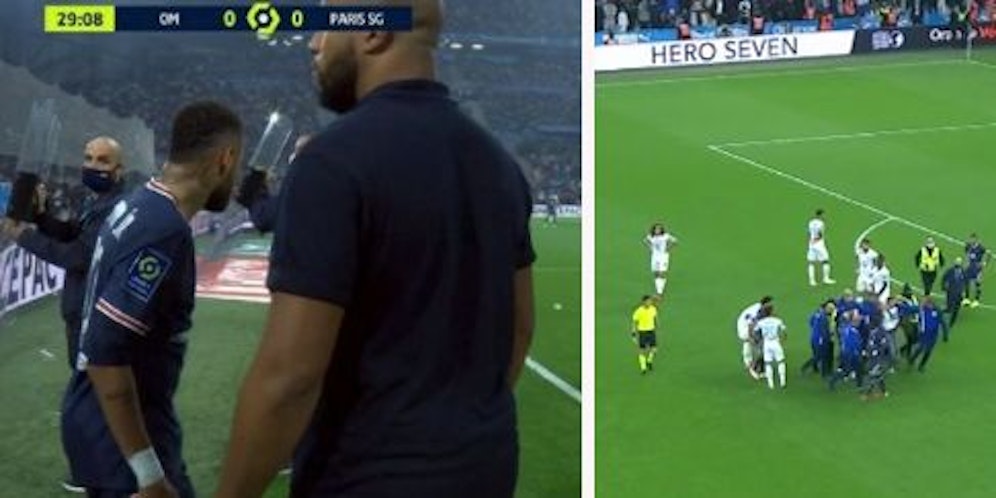 Neymar wird mit Schildern vor Wurfgegenständen geschützt. Rechts schützen Ordner Messi vor einem Flitzer.