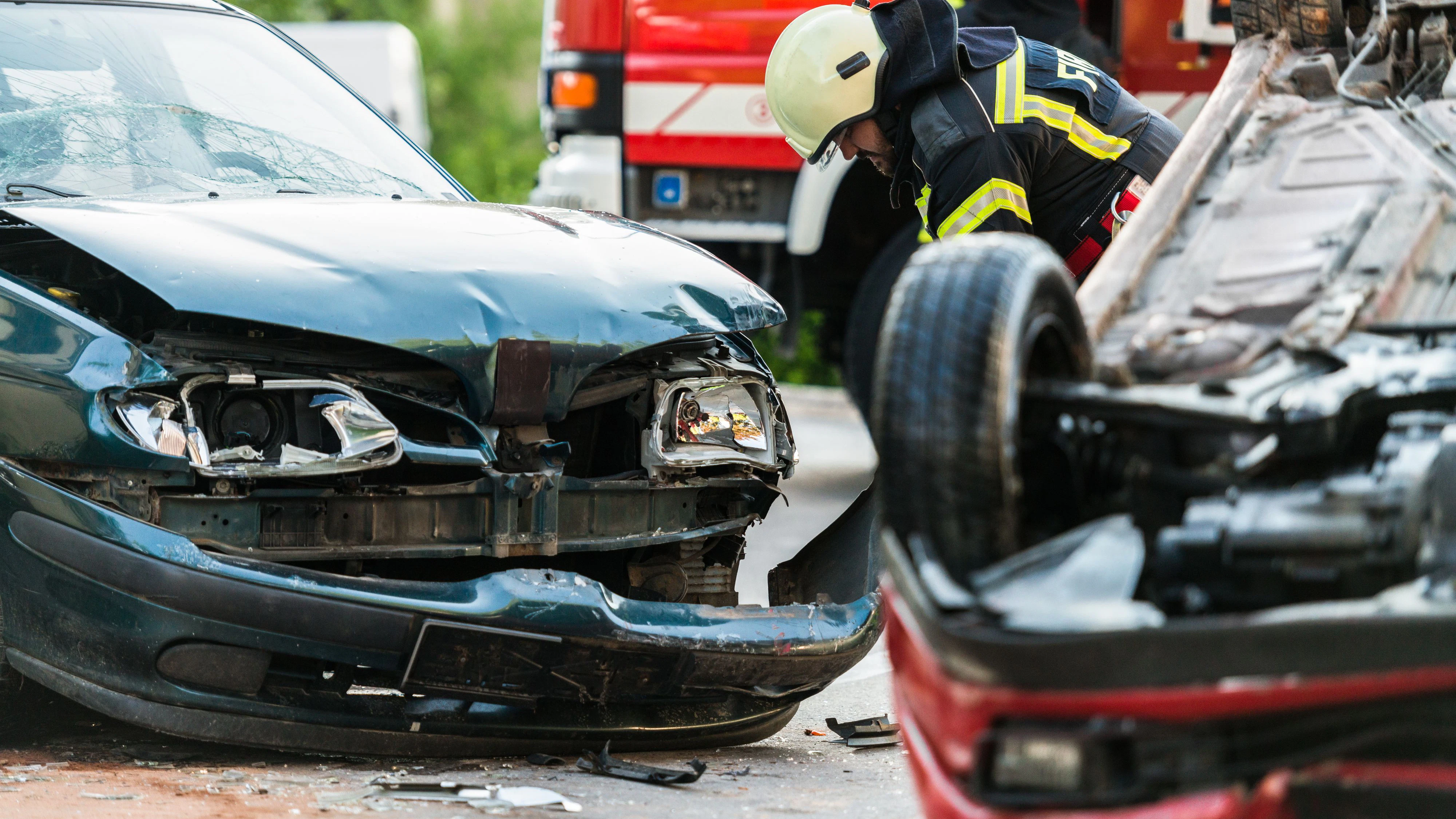 Firefighters At A Car Accident Scene