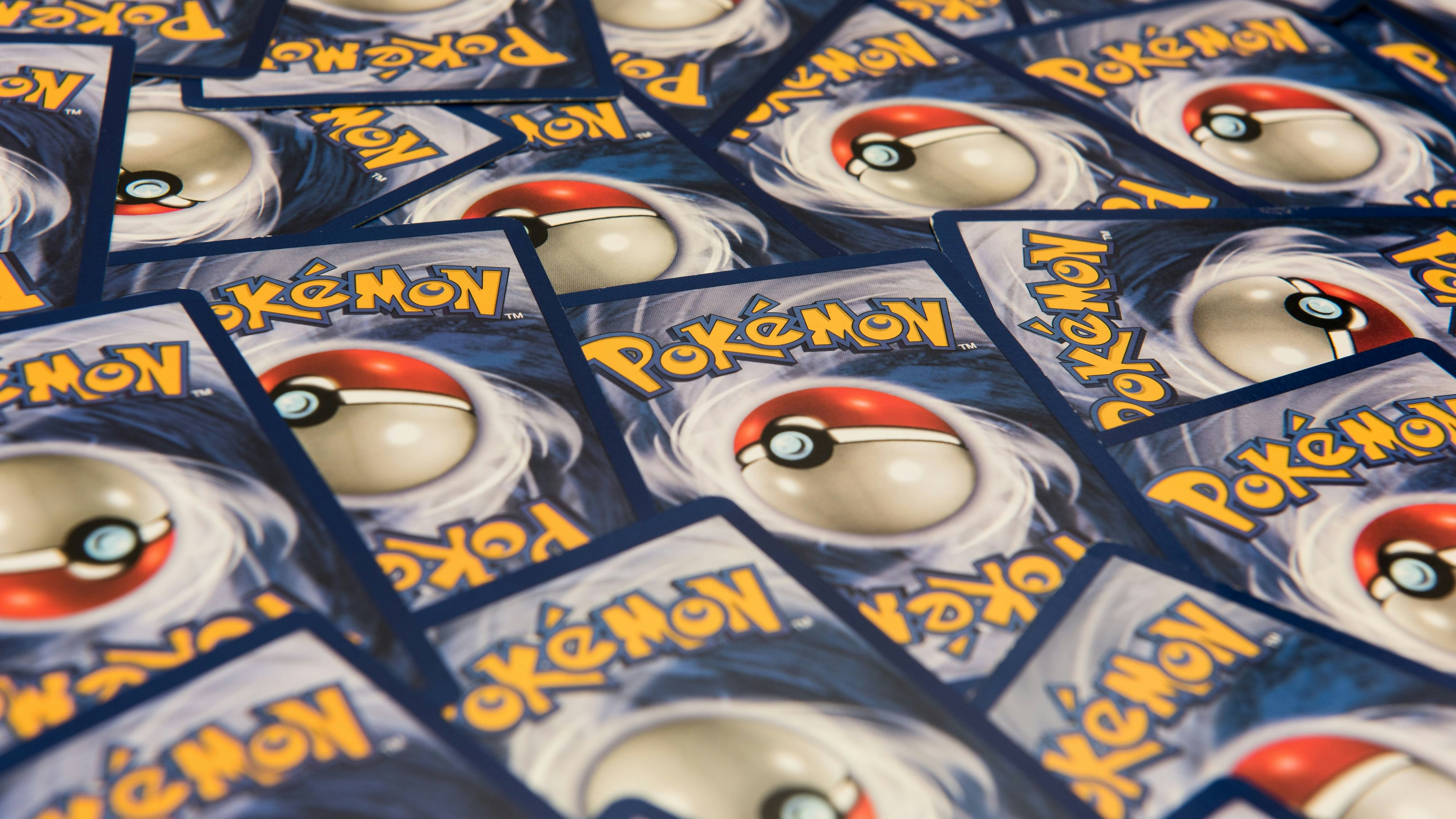 New York City, NY, USA - July 12, 2016: Pokemon trading cards background. Illustrative Editorial
