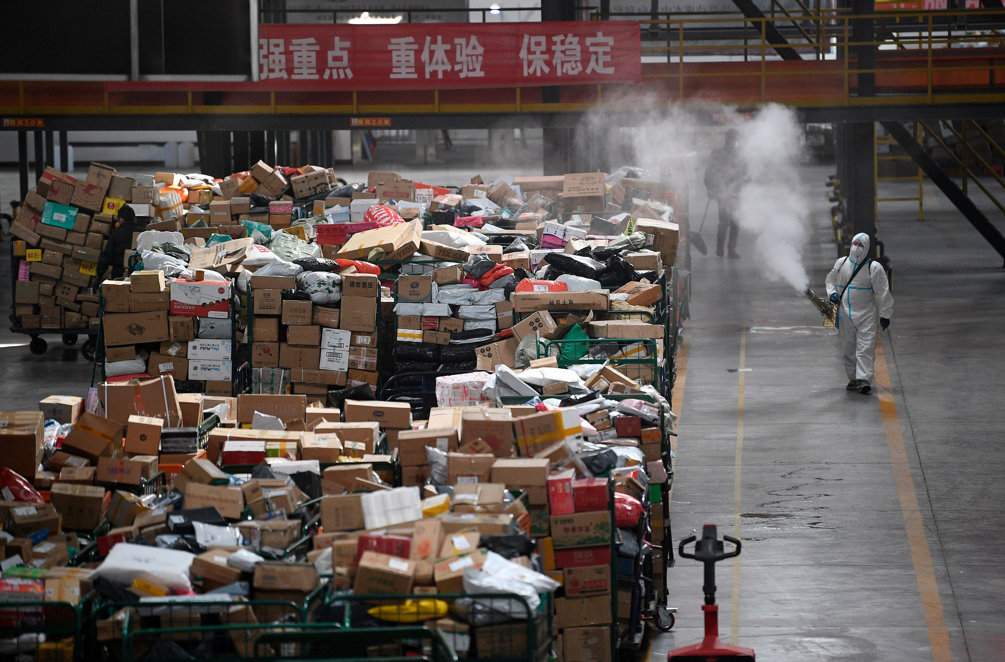 Download von www.picturedesk.com am 12.11.2021 (10:09).  (211111) -- YICHUAN, Nov. 11, 2021 (Xinhua) -- A staff member disinfects packages at a logistics center in Yinchuan, northwest China's Ningxia Hui Autonomous Region, Nov. 10, 2021. During the "Double Eleven" online shopping festival, logistics companies in Yinchuan have carried out strict disinfection and sorting measures on package delivery for epidemic control and prevention. . The annual "Double Eleven" festival, which falls on Thursday, was first started by Alibaba's e-commerce platform on Nov. 11, 2009, and quickly grew into a major shopping event. (Xinhua/Wang Peng).Xinhua News Agency / eyevine :...http://. - 20211110_PD16674 - Rechteinfo: Rights Managed (RM)