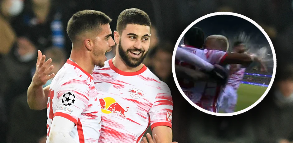 Josko Gvardiol köpft einen Bierbecher weg. 