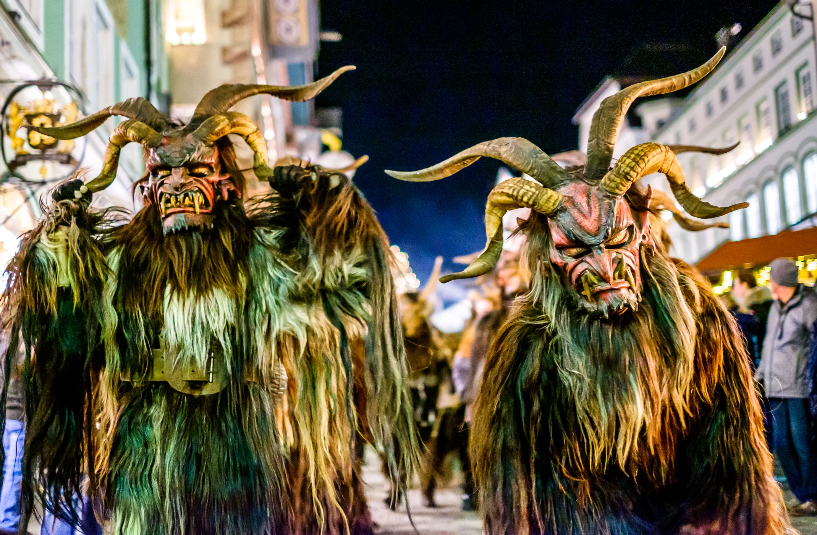 Bad Toelz, Germany - December 8: participant of a traditional pageant called krampuslauf with fantasy costumes and handmade wooden masks on December 8, 2018 in Bad Toelz, Germany