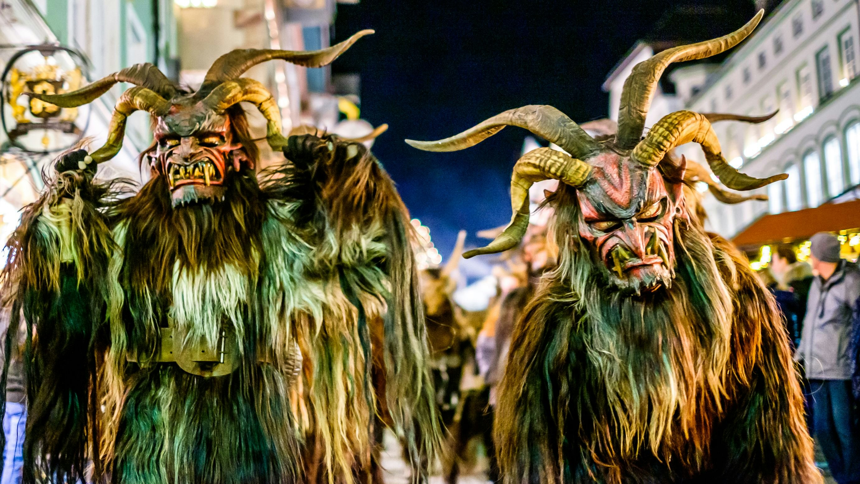 Bad Toelz, Germany - December 8: participant of a traditional pageant called krampuslauf with fantasy costumes and handmade wooden masks on December 8, 2018 in Bad Toelz, Germany