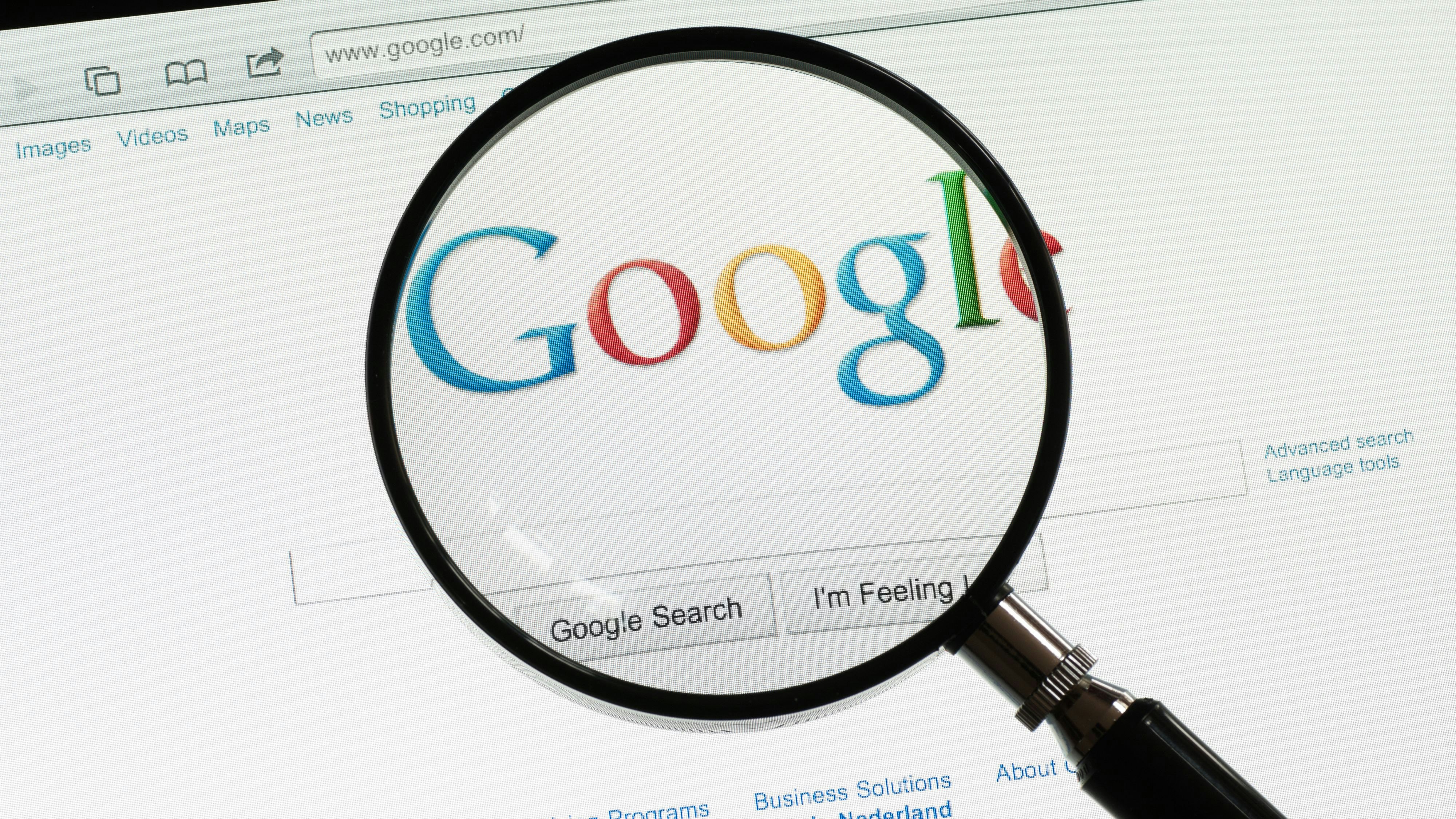 "Utrecht, The Netherlands - June 12, 2011: A magnifying glass on the Google homepage. Google is the most popular web search engine."