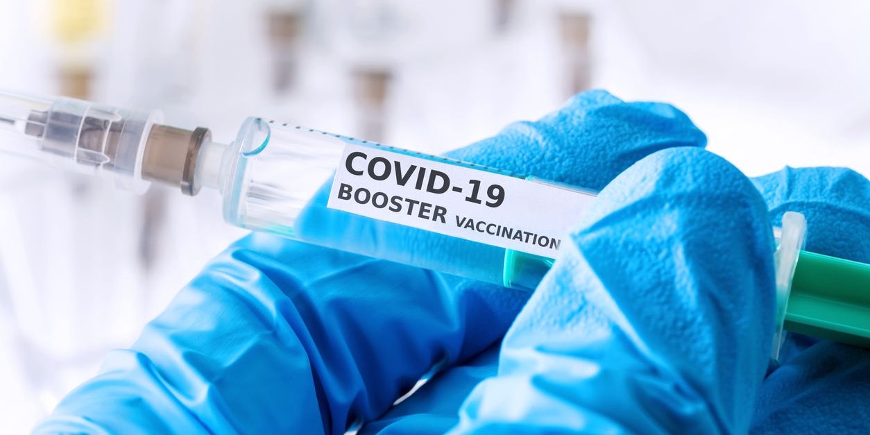 covid-19 coronavirus booster vaccination concept