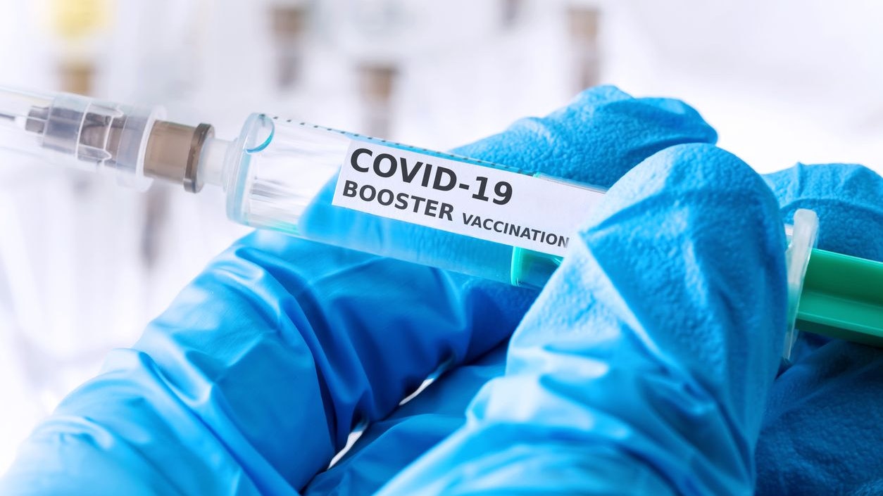 covid-19 coronavirus booster vaccination concept