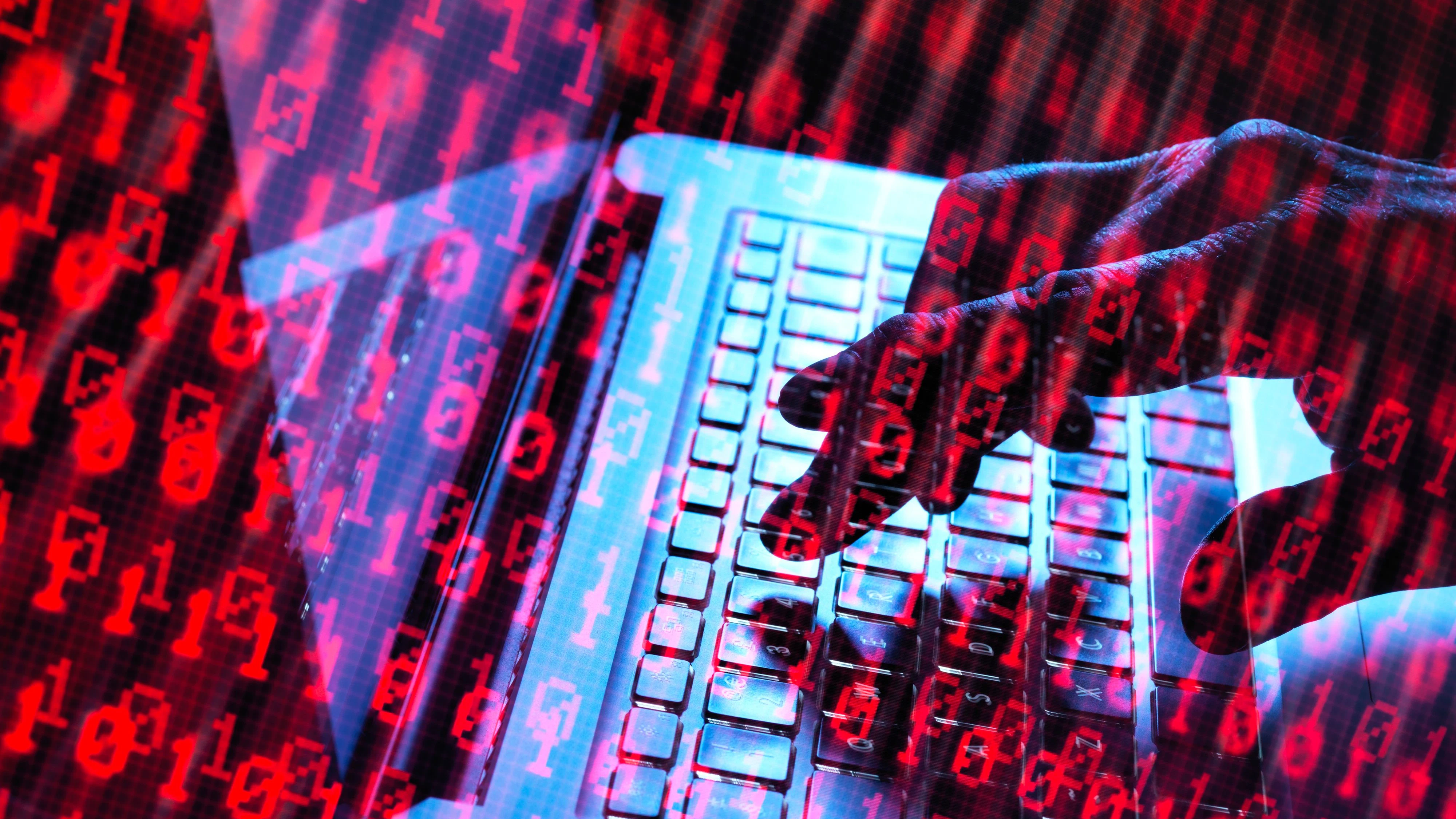 Download von www.picturedesk.com am 13.12.2021 (18:28).  MODEL RELEASED. Cyber attack, conceptual image. Hacker accessing somebody else's computer programme. - 20180418_PD9207 - Rechteinfo: Royalty Free (RF)