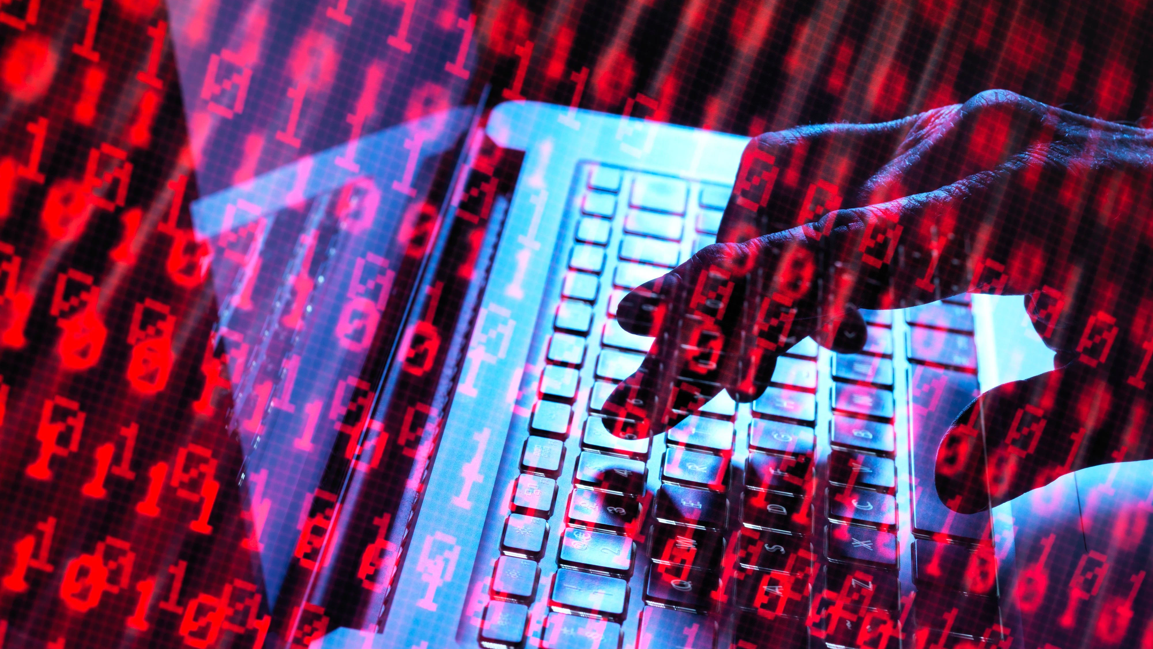 Download von www.picturedesk.com am 13.12.2021 (18:28).  MODEL RELEASED. Cyber attack, conceptual image. Hacker accessing somebody else's computer programme. - 20180418_PD9207 - Rechteinfo: Royalty Free (RF)