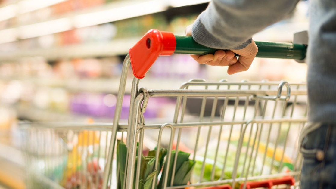 Close-up detail of a man shopping in a supermarket