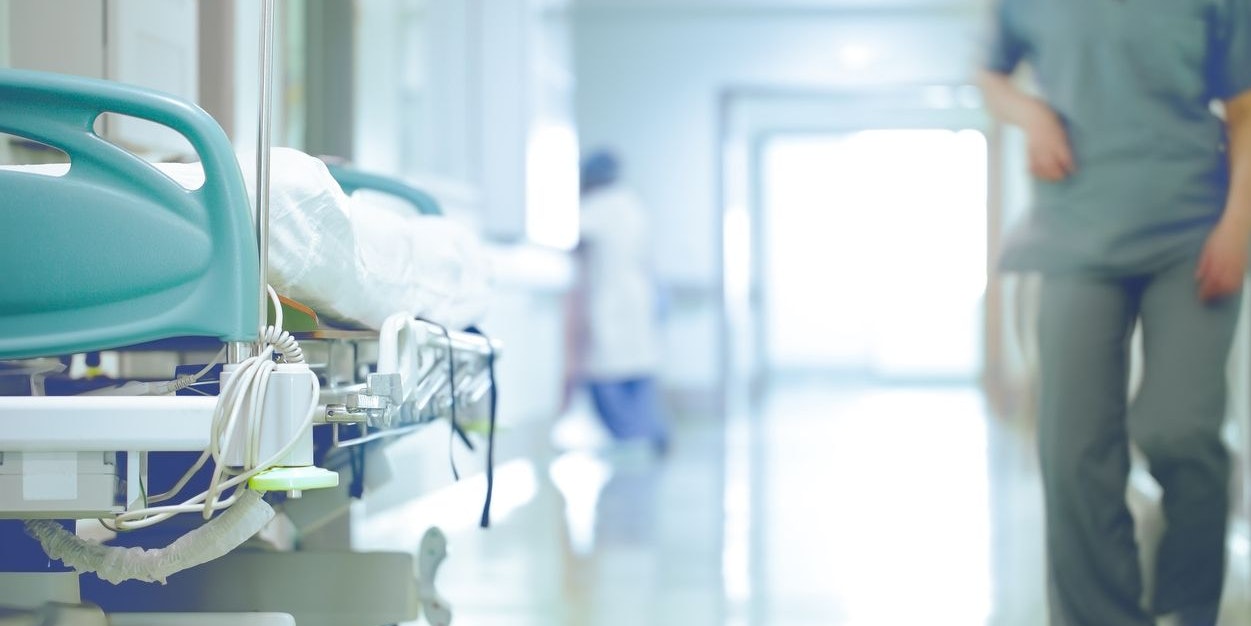 Bed in hallway. The concept of working stressful environment