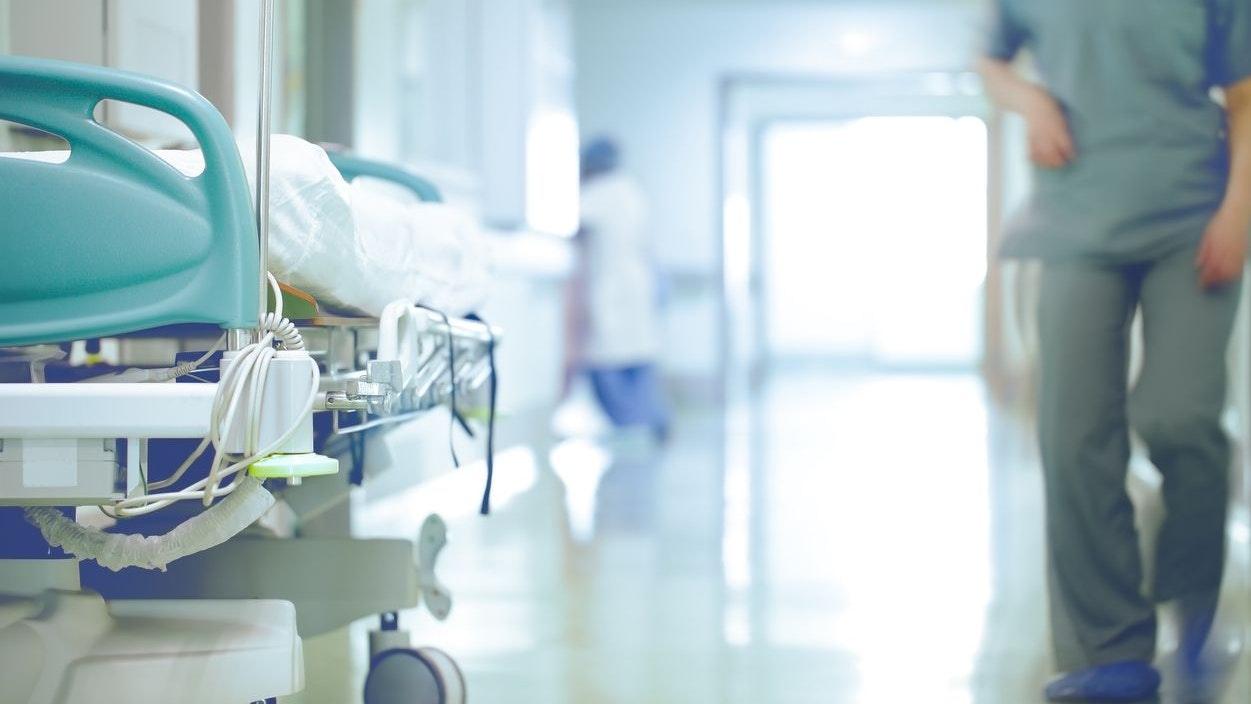 Bed in hallway. The concept of working stressful environment