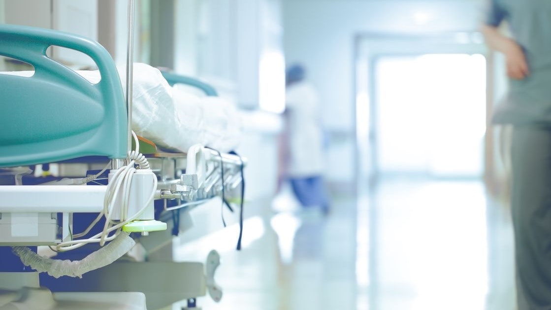 Bed in hallway. The concept of working stressful environment