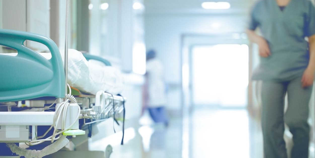 Bed in hallway. The concept of working stressful environment