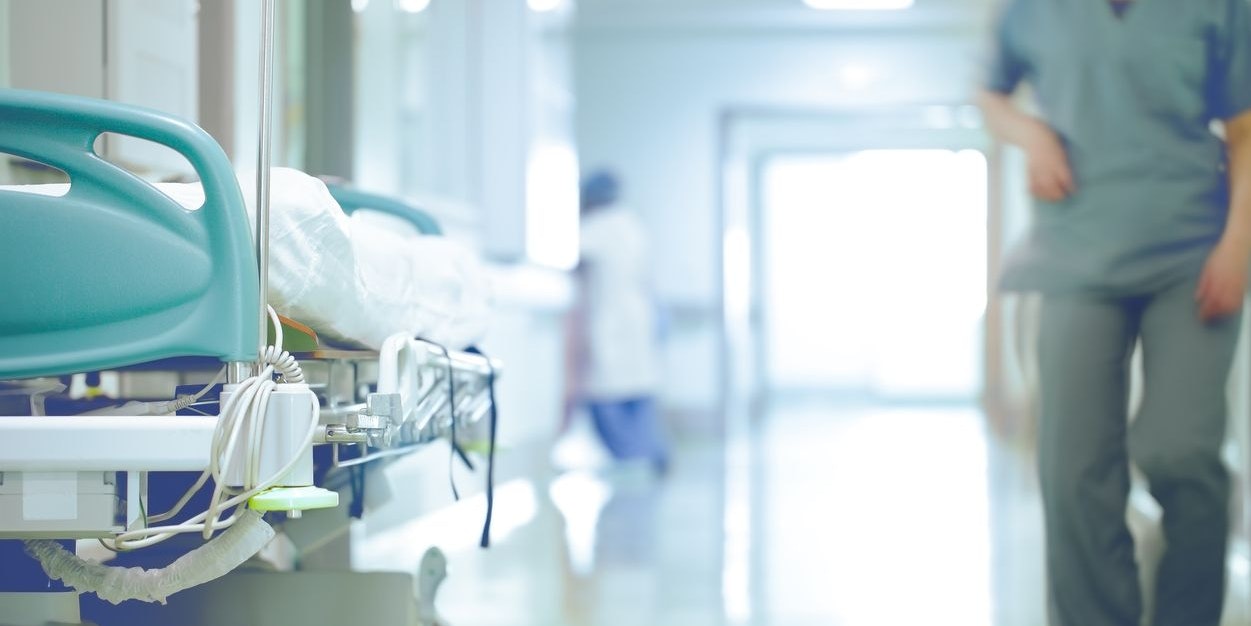 Bed in hallway. The concept of working stressful environment