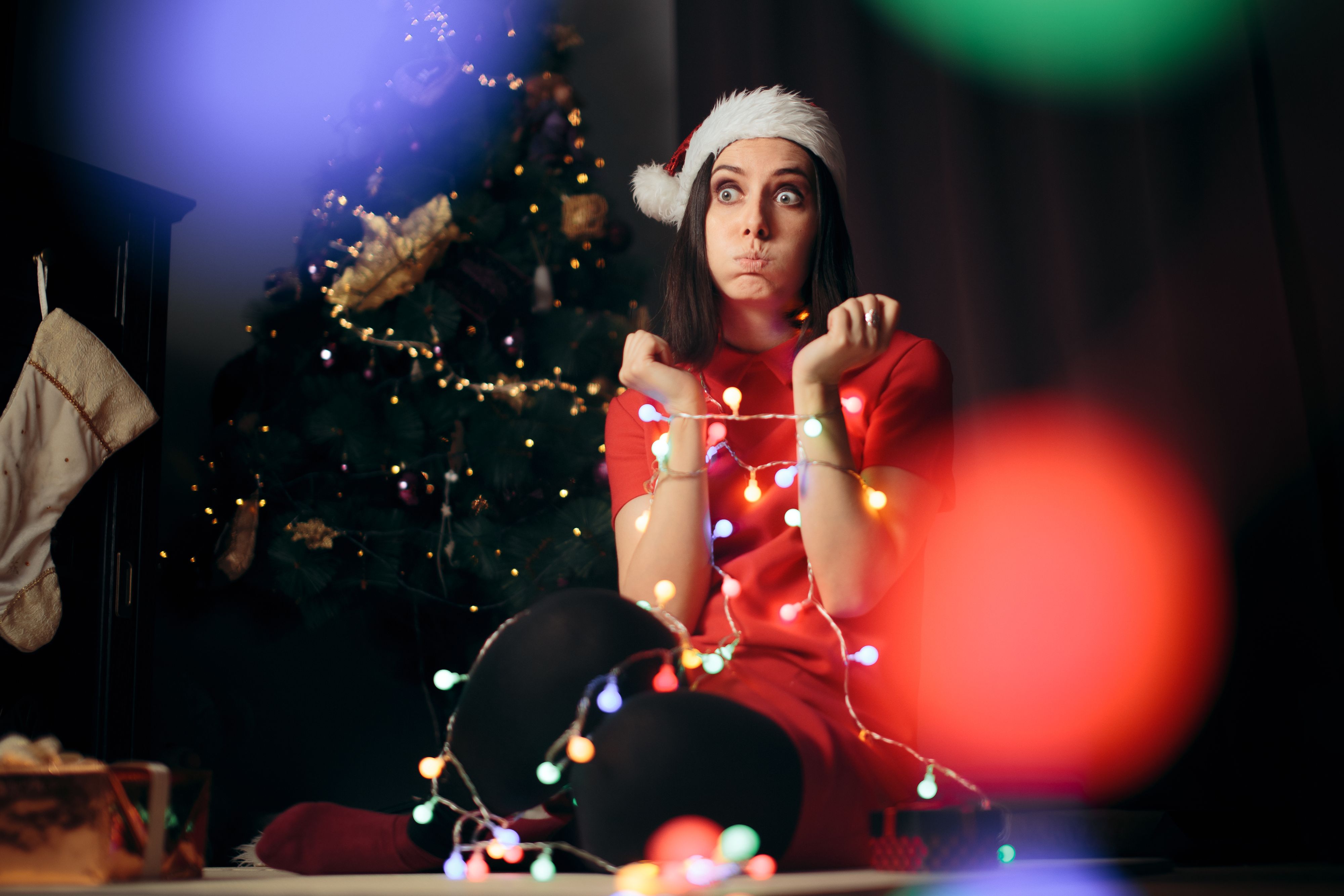 Unhappy girl feeling stuck at home for winter holidays