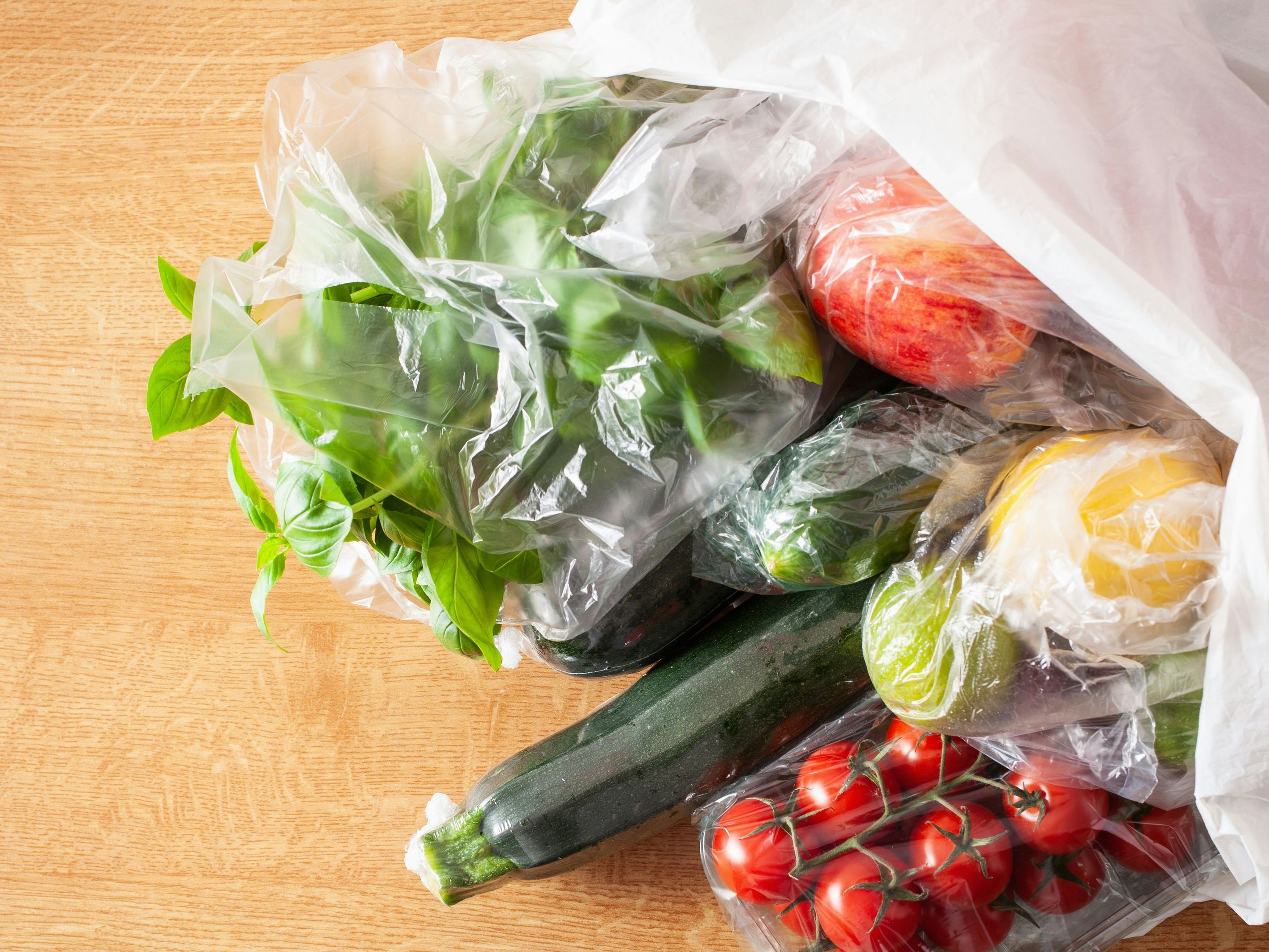 single use plastic packaging issue. fruits and vegetables in plastic bags