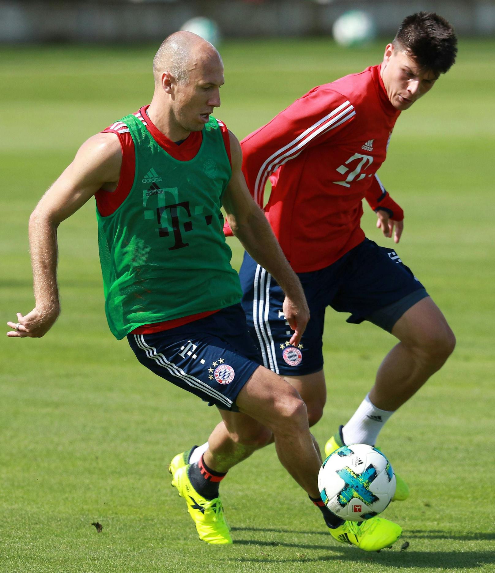 Flavius Daniliuc trainierte auch bei den Bayern-Profis, hier mit Arjen Robben.