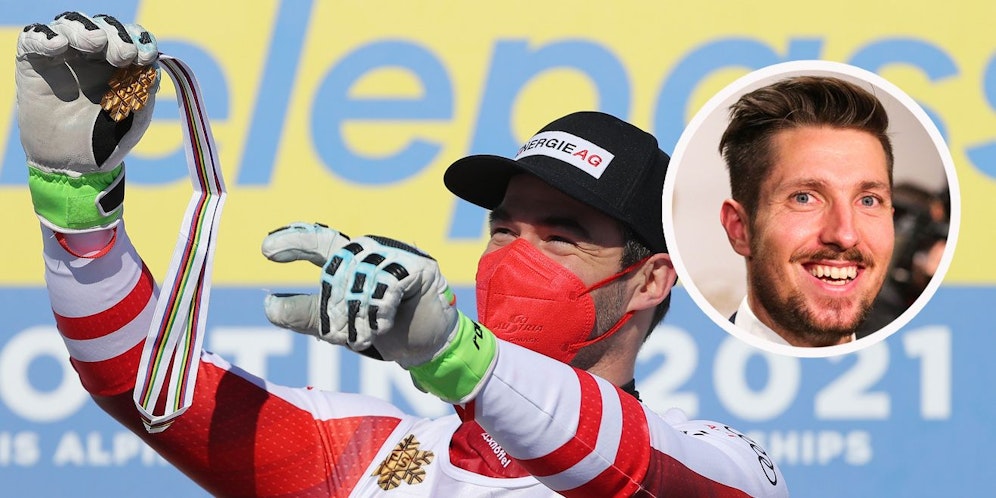 Vincent Kriechmayr jubelt über Gold. Marcel Hirscher gratuliert.