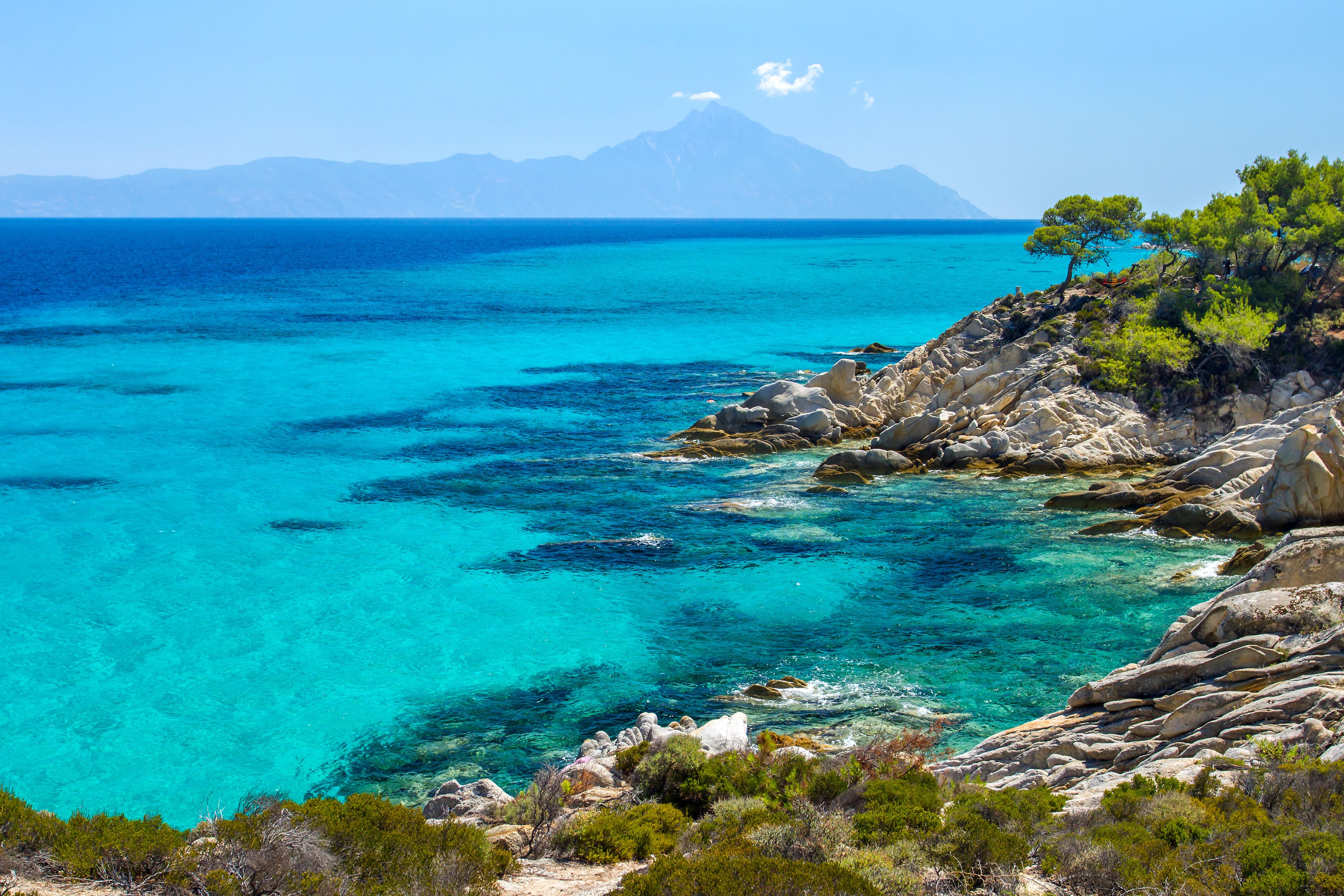 Rocky coastline and a beautiful clear water at Halkidiki Kassandra peninsula in Greece