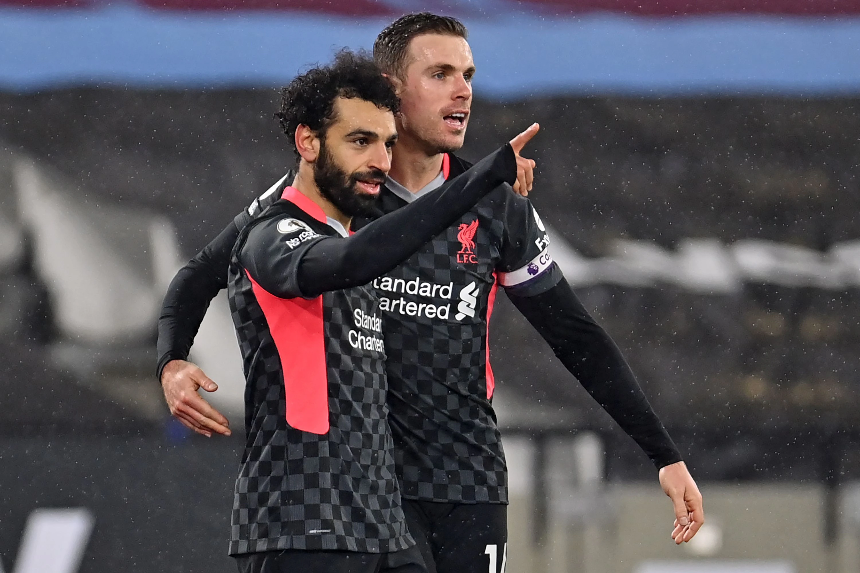 Mo Salah und Jordan Henderson müssen im Champions-League-Achtelfinale nach Budapest.