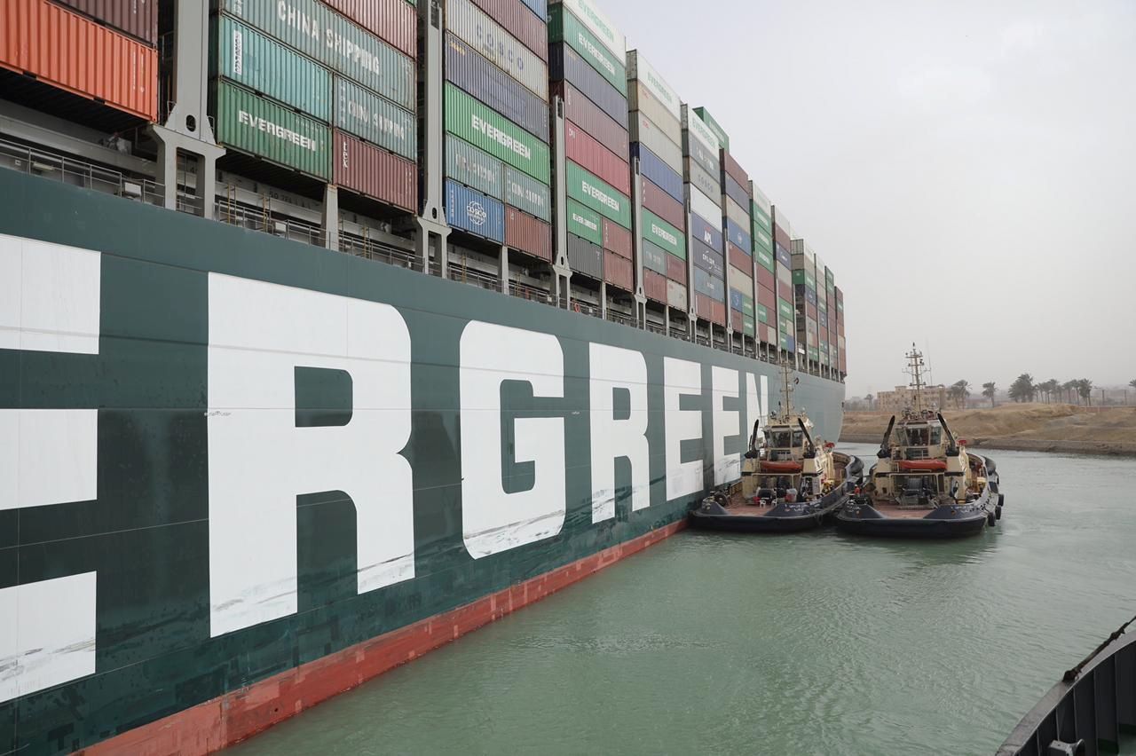 Stranded container ship Ever Given, one of the world's largest container ships, is seen after it ran aground, in Suez Canal, Egypt March 25, 2021. Suez Canal Authority/Handout via REUTERS ATTENTION EDITORS - THIS IMAGE WAS PROVIDED BY A THIRD PARTY. NO RESALES. NO ARCHIVES