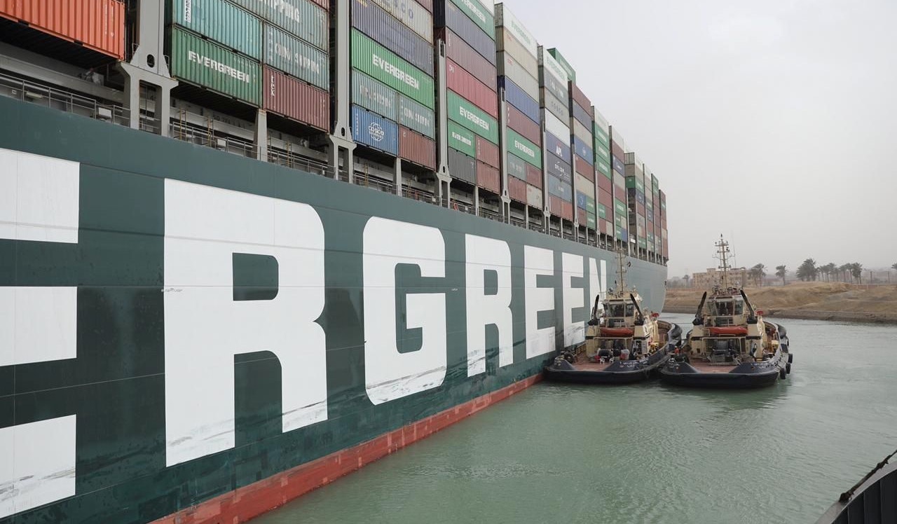 Stranded container ship Ever Given, one of the world's largest container ships, is seen after it ran aground, in Suez Canal, Egypt March 25, 2021. Suez Canal Authority/Handout via REUTERS ATTENTION EDITORS - THIS IMAGE WAS PROVIDED BY A THIRD PARTY. NO RESALES. NO ARCHIVES