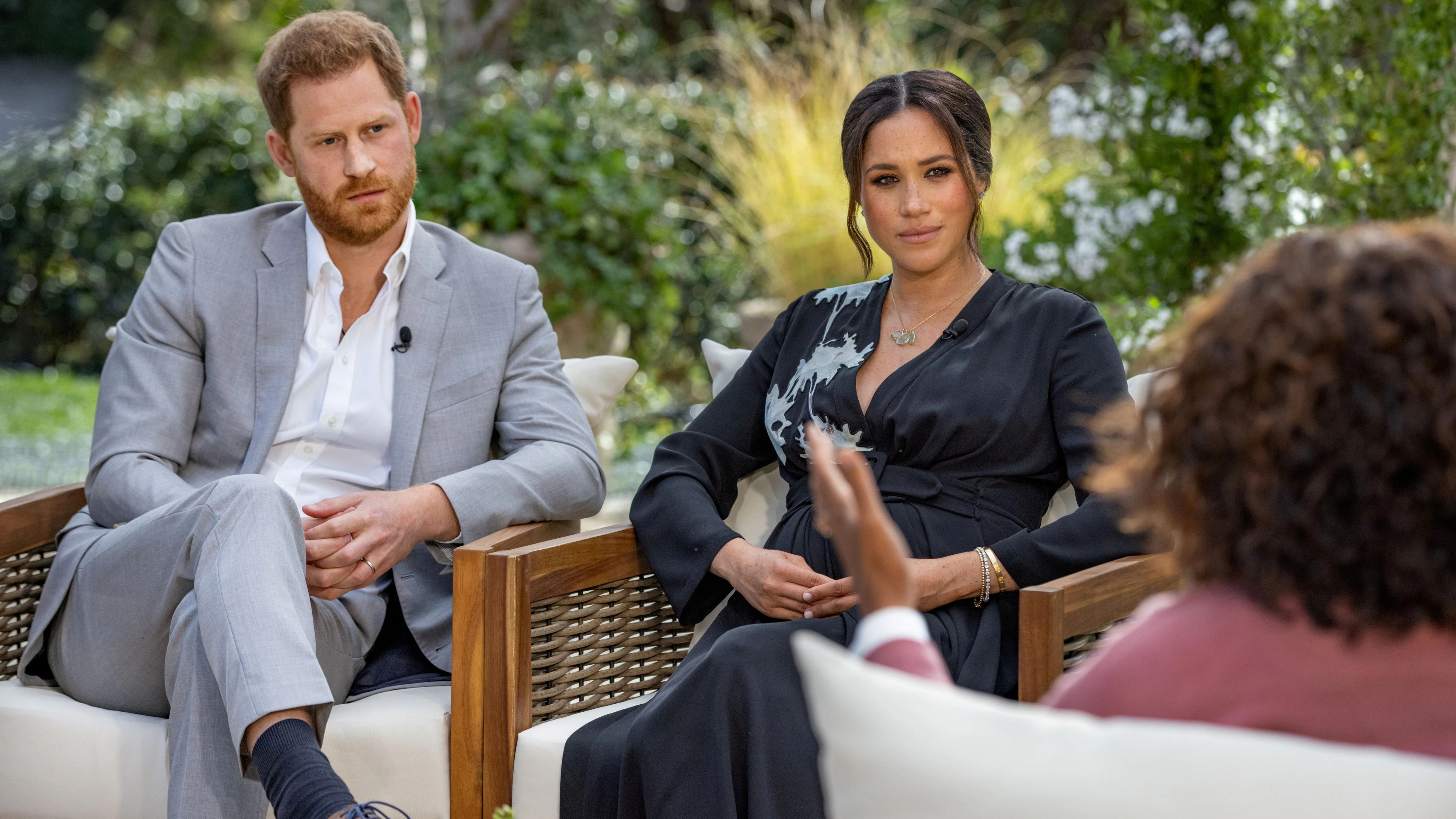 FILE PHOTO: Britain's Prince Harry and Meghan, Duchess of Sussex, are interviewed by Oprah Winfrey in this undated handout photo.  Harpo Productions/Joe Pugliese/Handout via REUTERS/File Photo