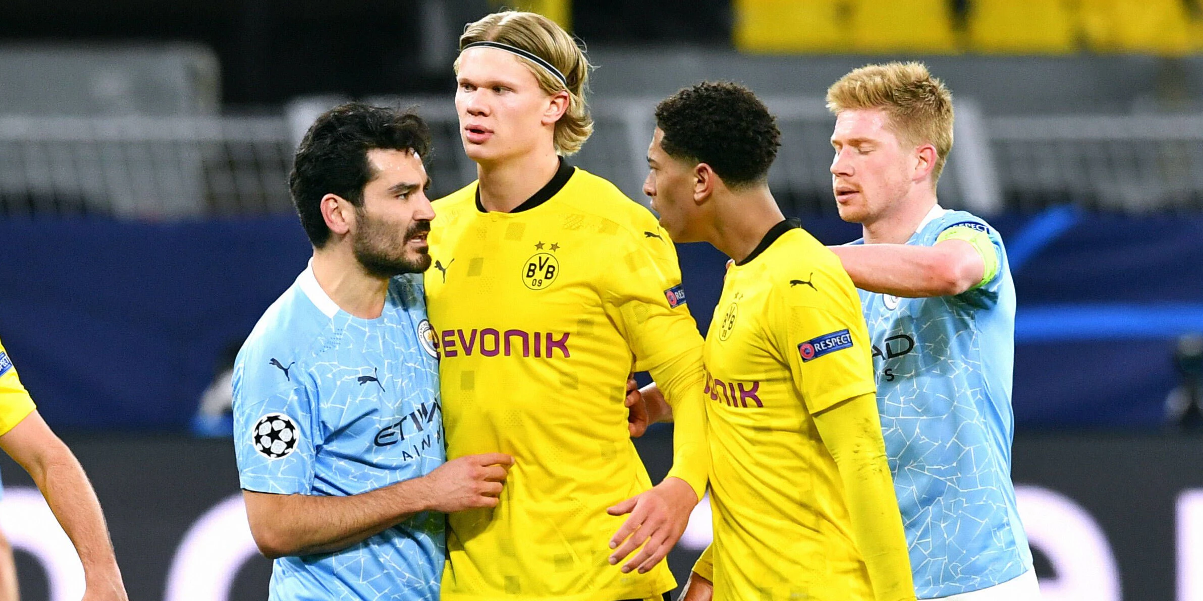 Gündogan (l.) im Duell mit Haaland