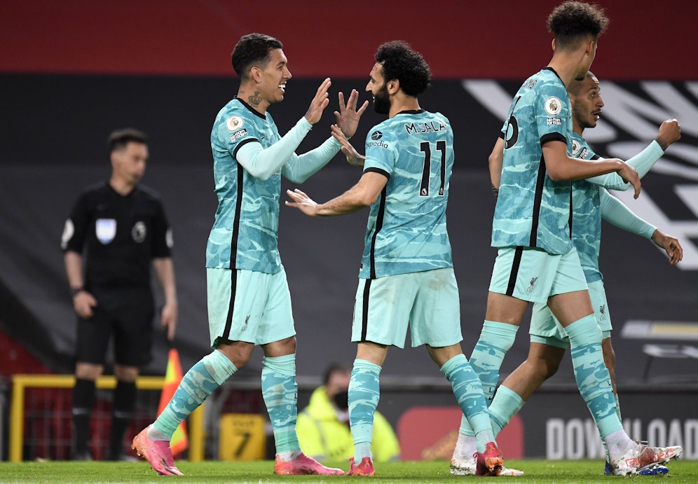 Liverpool feiert den Sieg bei Manchester United. 