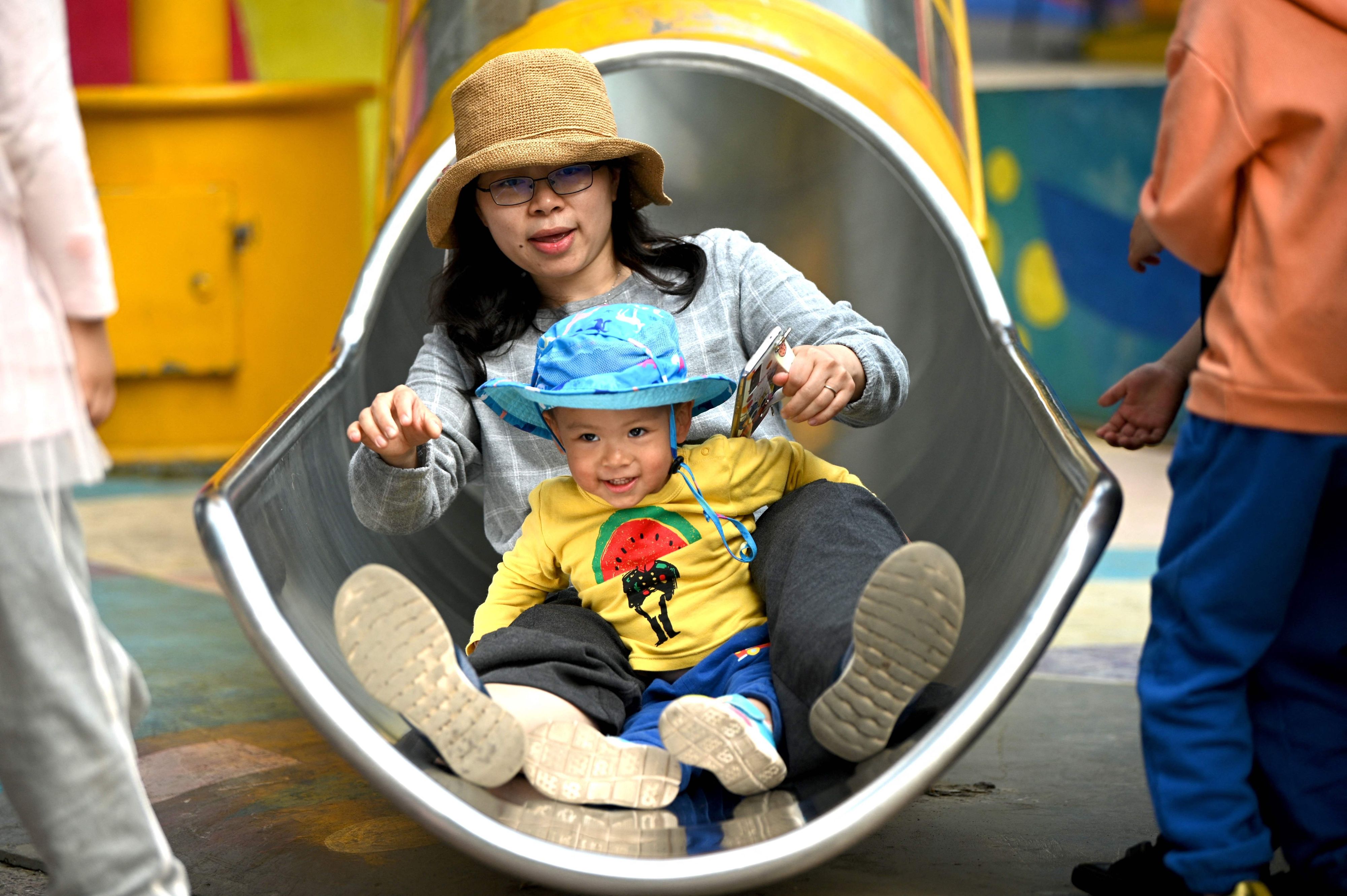Peking erlaubt es Paaren, drei Kinder zu bekommen