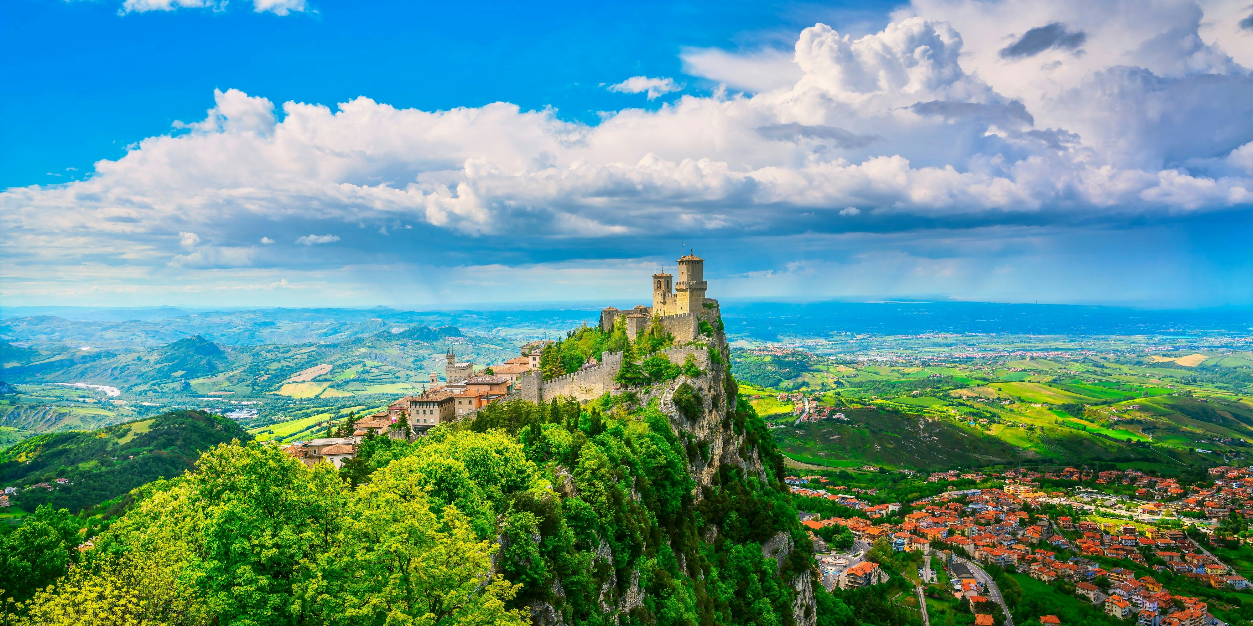 San Marino Republic, medieval Guaita first tower on a rocky cliff and panoramic view of Romagna