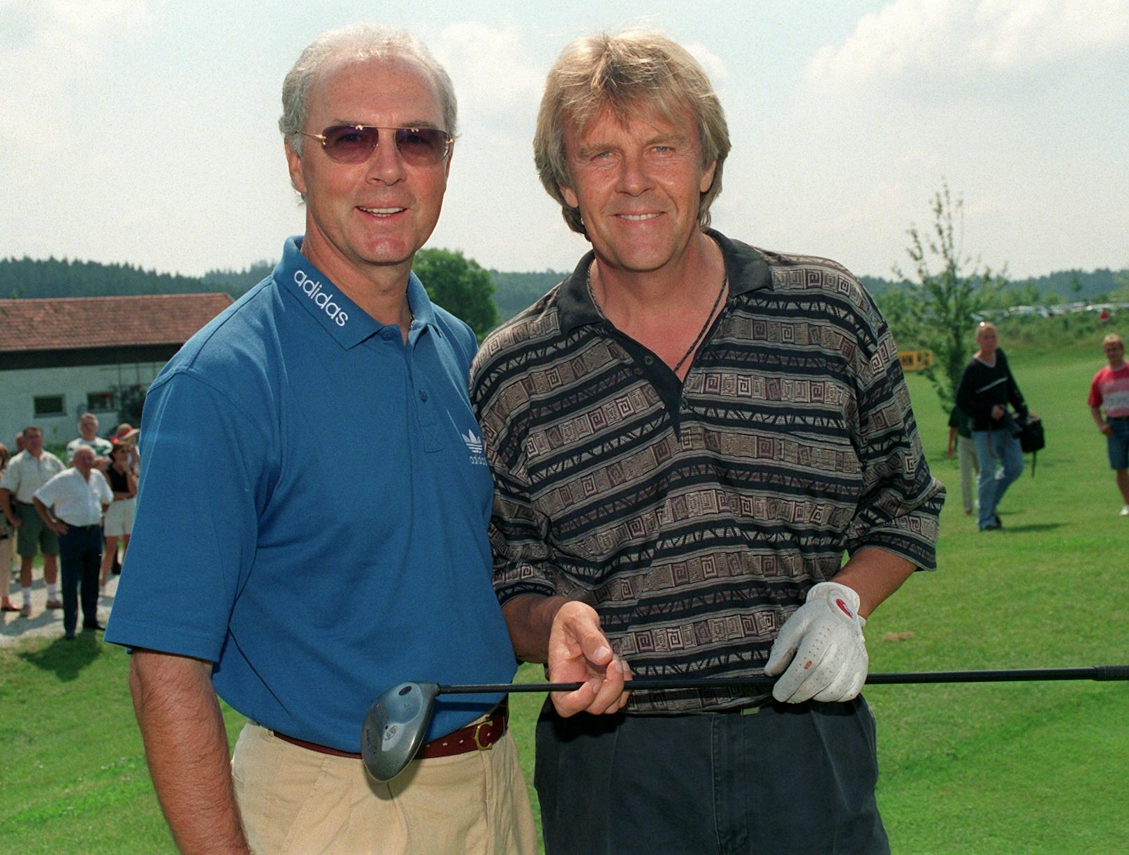 Howard ist leidenschaftlicher Hobby-Golfer (hier mit Fußball-Legende <strong>Franz Beckenbauer</strong>, 1997)