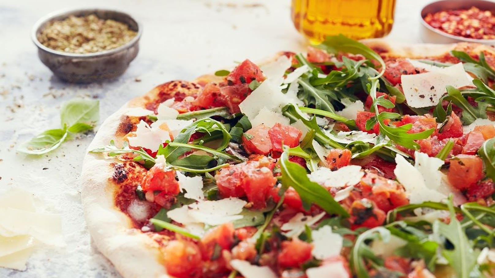 Die beliebte Pizza Bruschetta wird auch weiterhin in den Vapianos in Österreich erhältlich sein.