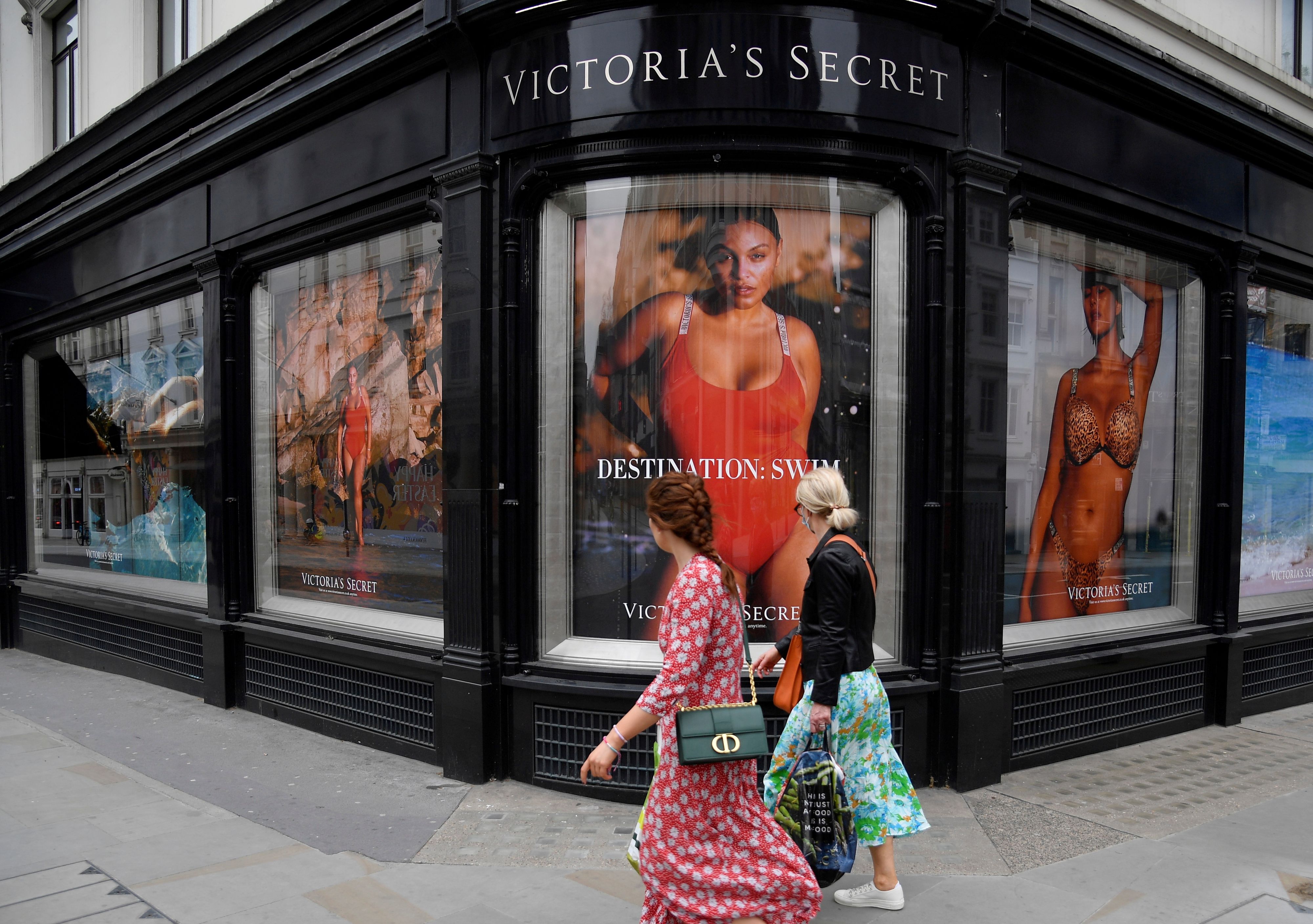 FILE PHOTO: People pass a window display at a branch of Victoria's Secret in New Bond Street in London, Britain, March 31, 2021. REUTERS/Toby Melville/File Photo