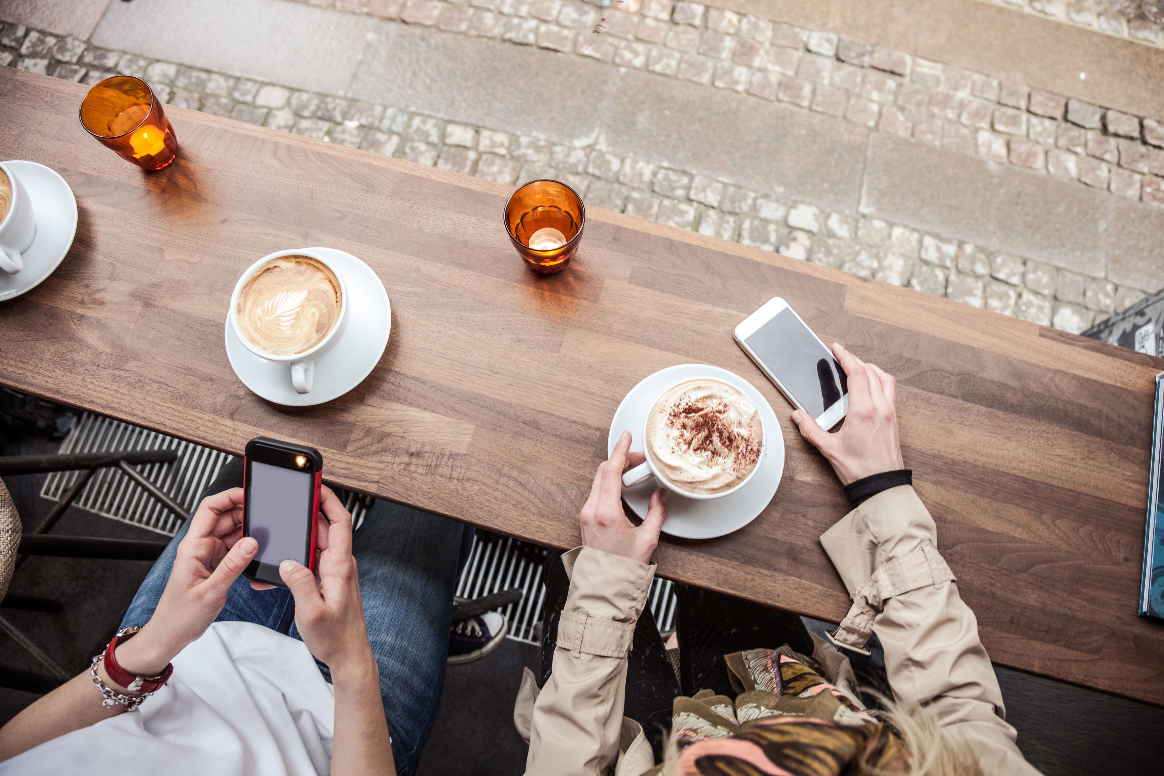 Cappuccino served on a cafe table in Copenhagen - Denmark.