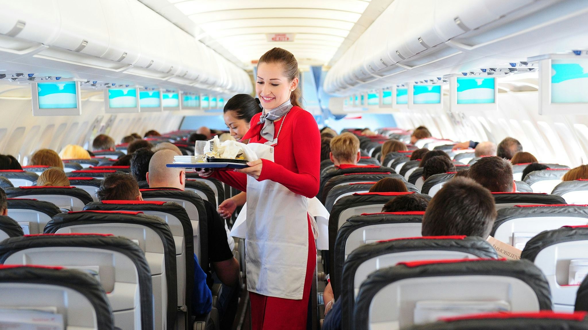 An Board der Austrian Airlines verzichtet man künftig auf "Damen und Herren". 