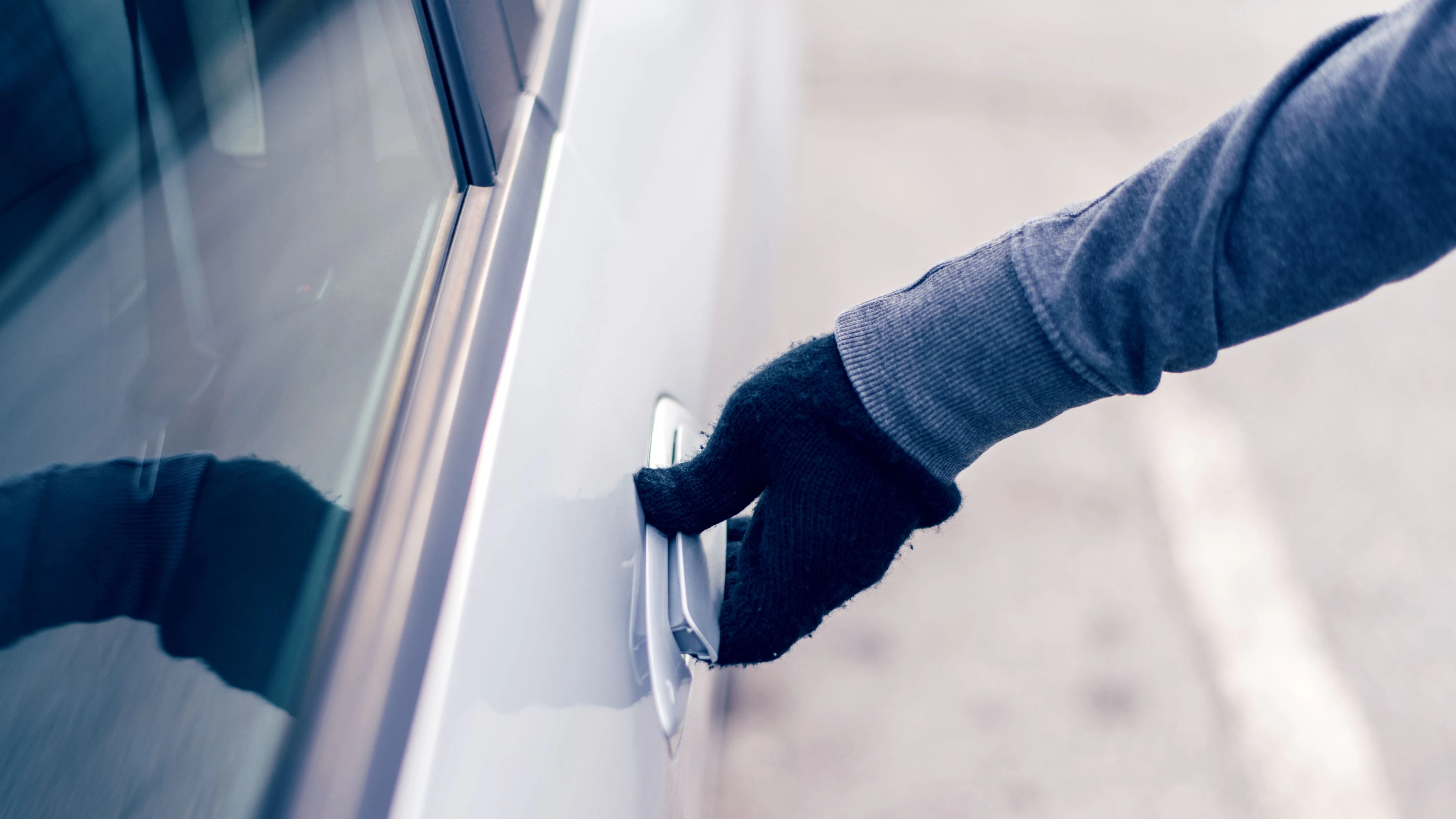 Man stealing a car