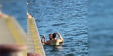 Wiener Pärchen badet trotz eisiger Kälte in Donau