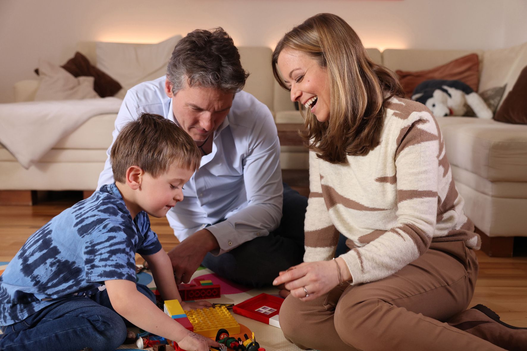 Glückliche Familie: Wolfgang und Pia Raunjack mit ihrem Sohn Noah (5).