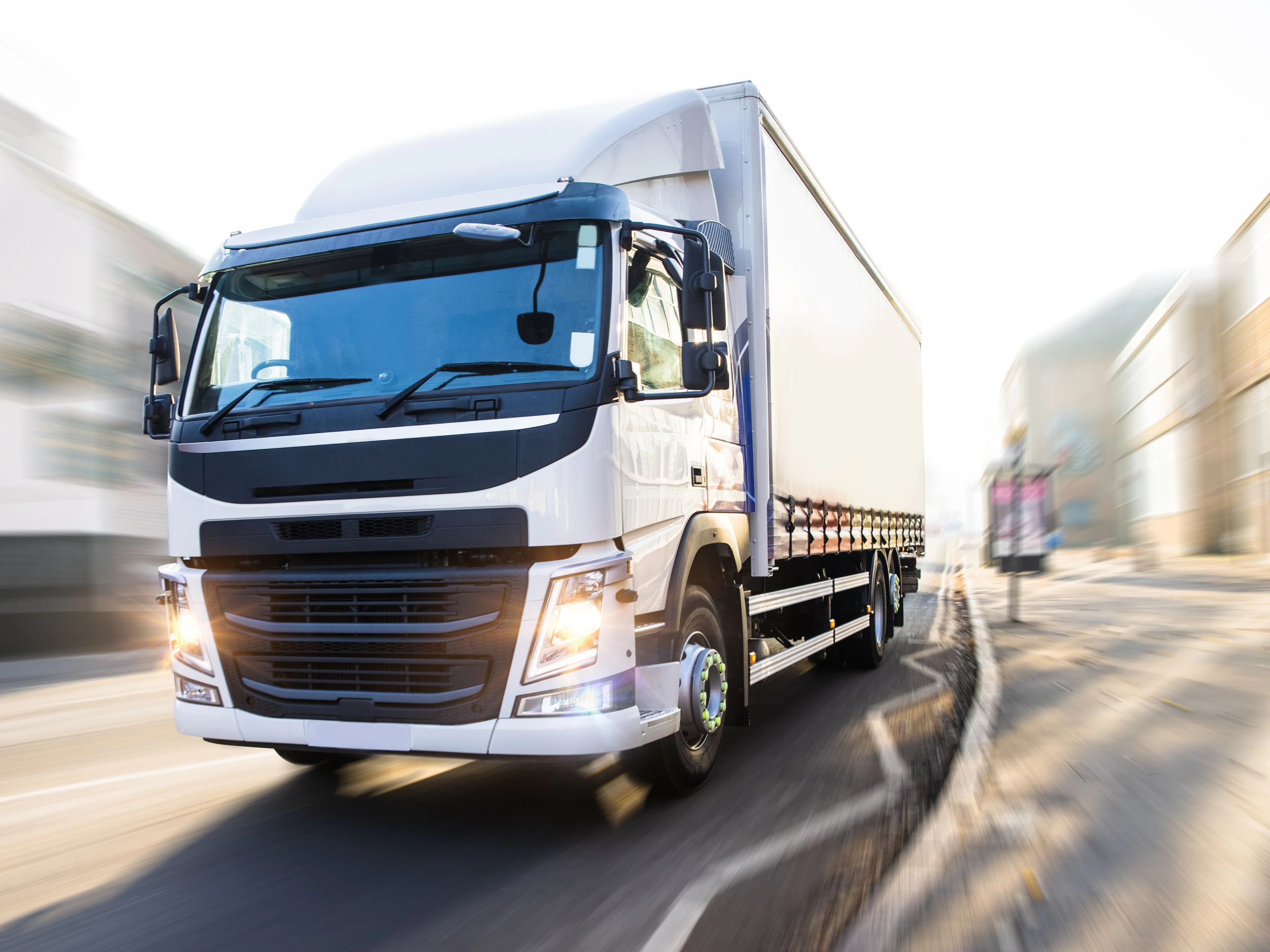 White Truck in motion isolated with clipping path