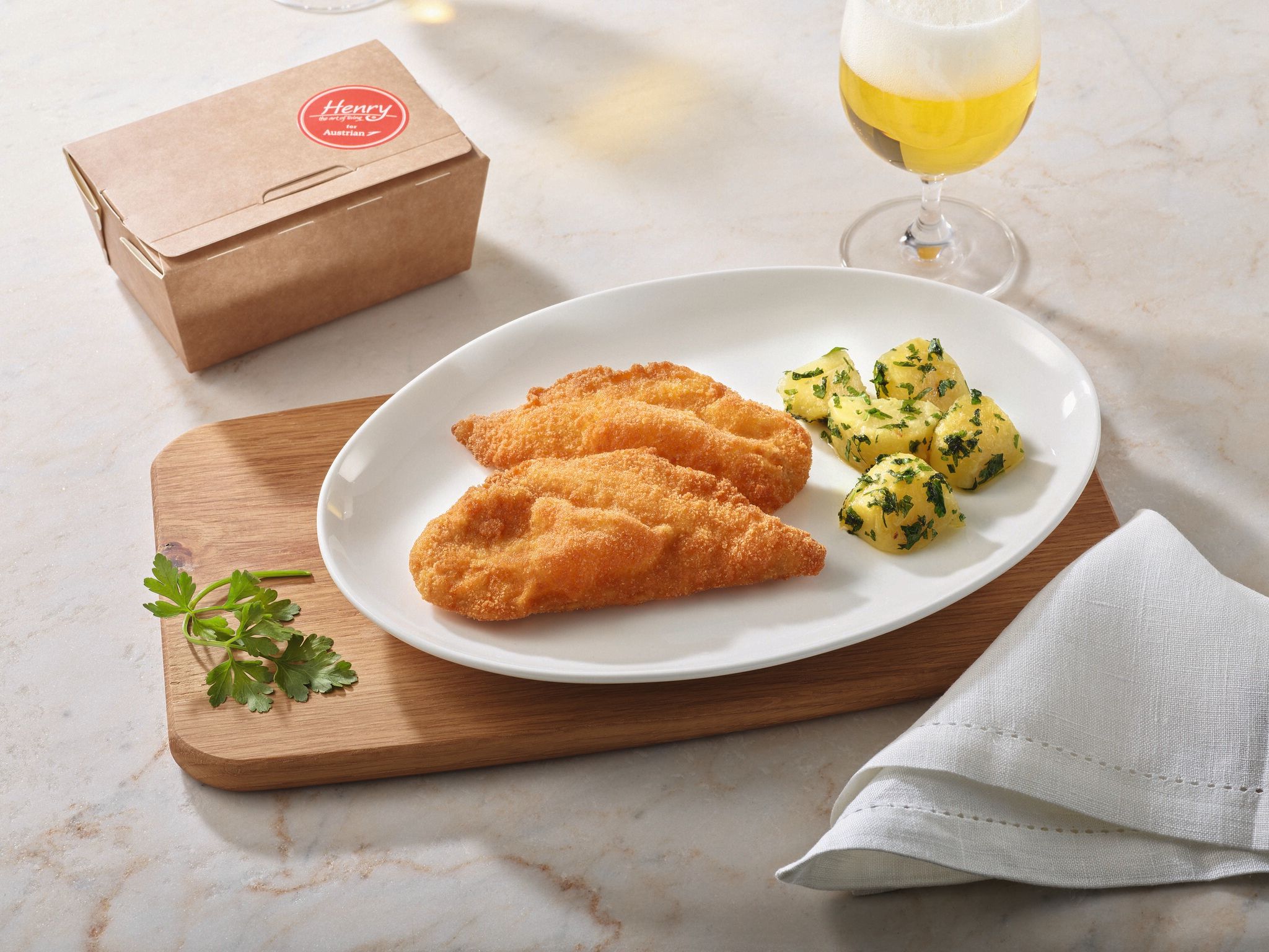 Bleiben der AUA Schnitzel übrig, kann man sie verbilligt für zu Hause mitnehmen.