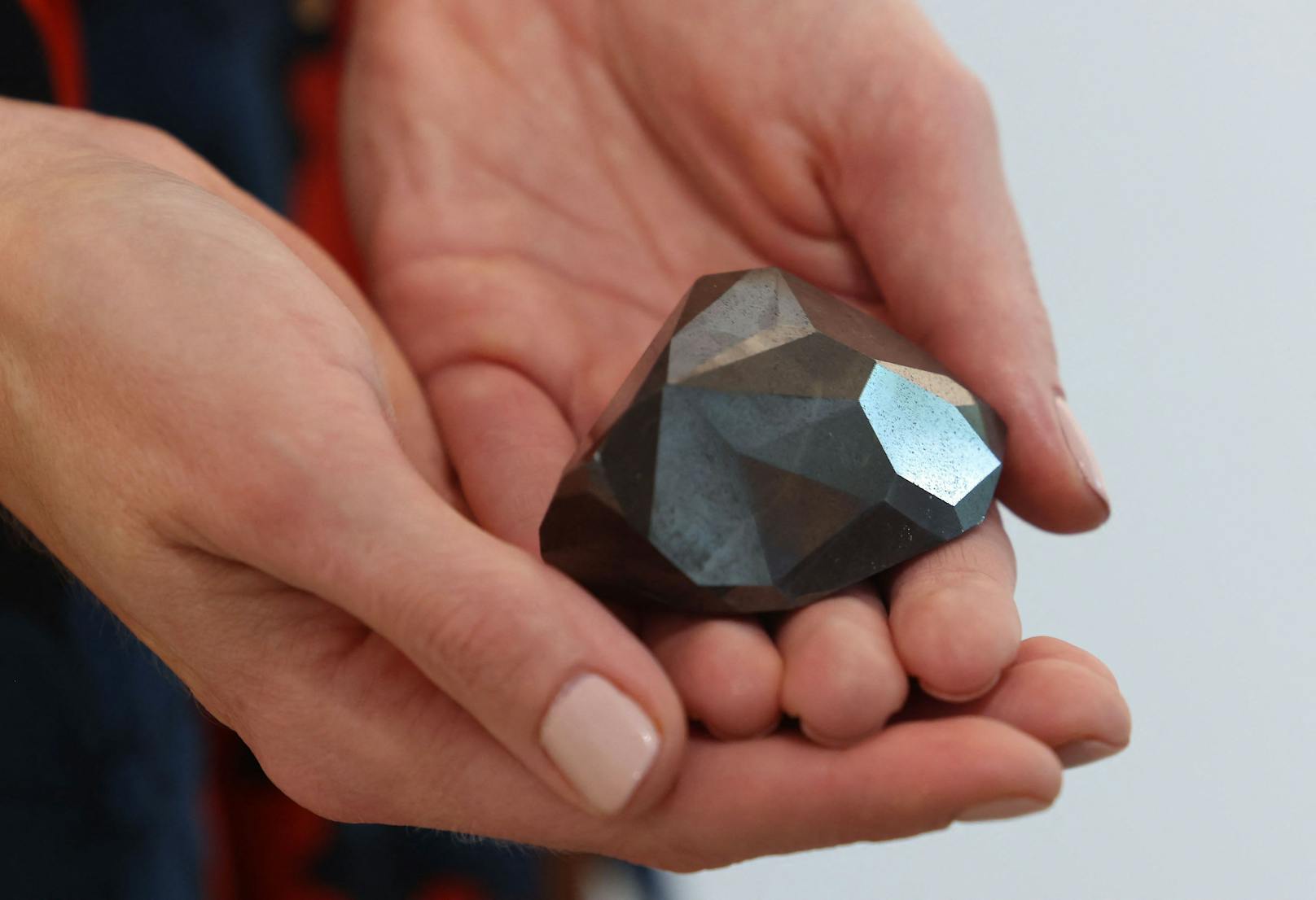 "The Enigma", a 555.55 carat black diamond, at Sotheby's in the Gulf emirate of Dubai.&nbsp;