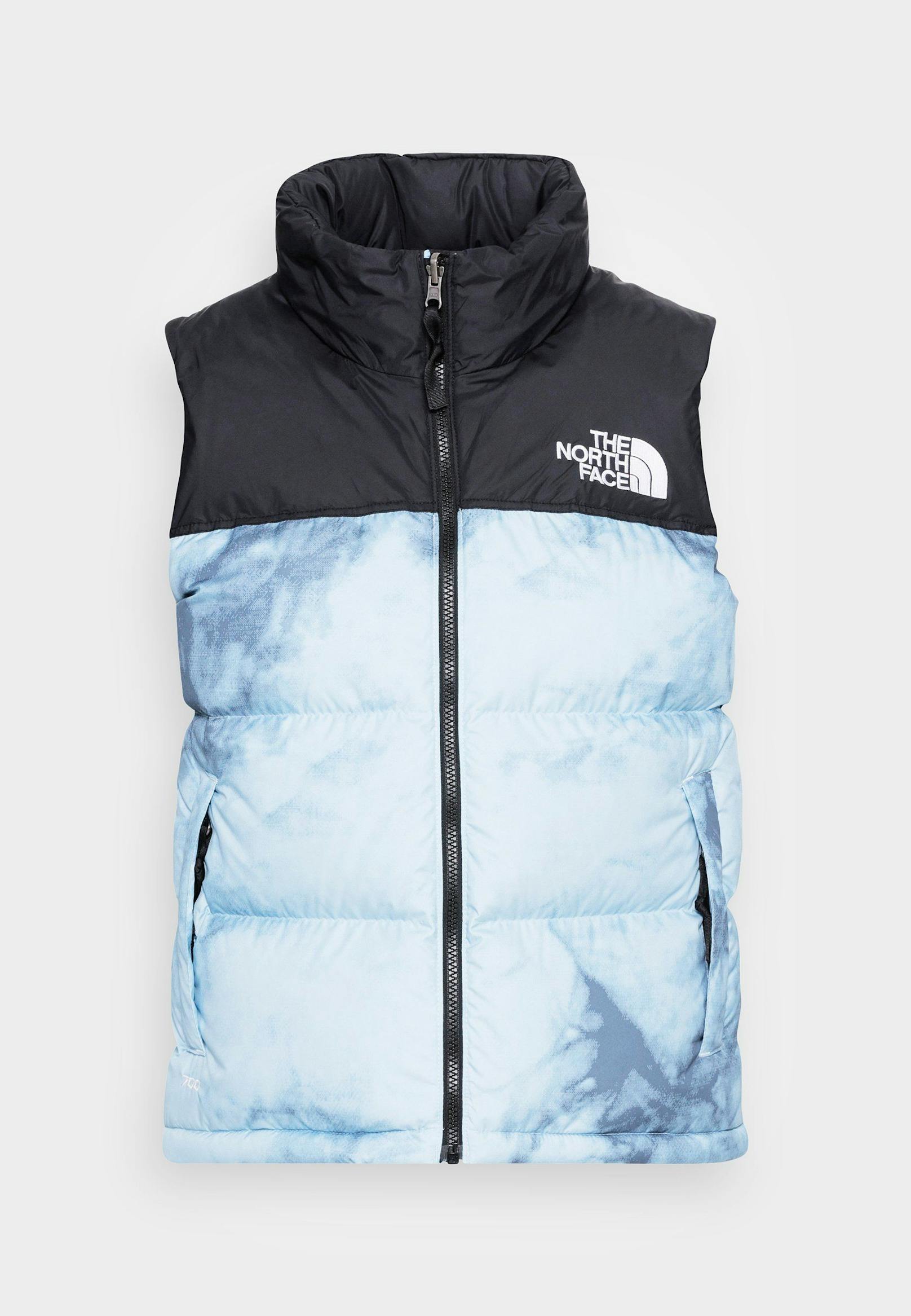 PRINTED 1996 RETRO NUPTSE VEST - Weste von The North Face: <strong><a target="_blank" href="https://www.zalando.at/the-north-face-printed-1996-retro-nuptse-vest-weste-beta-blue-dye-texture-print-th321u01k-k11.html">Im Zalando-Shop um € 239,95 zu haben.</a></strong>