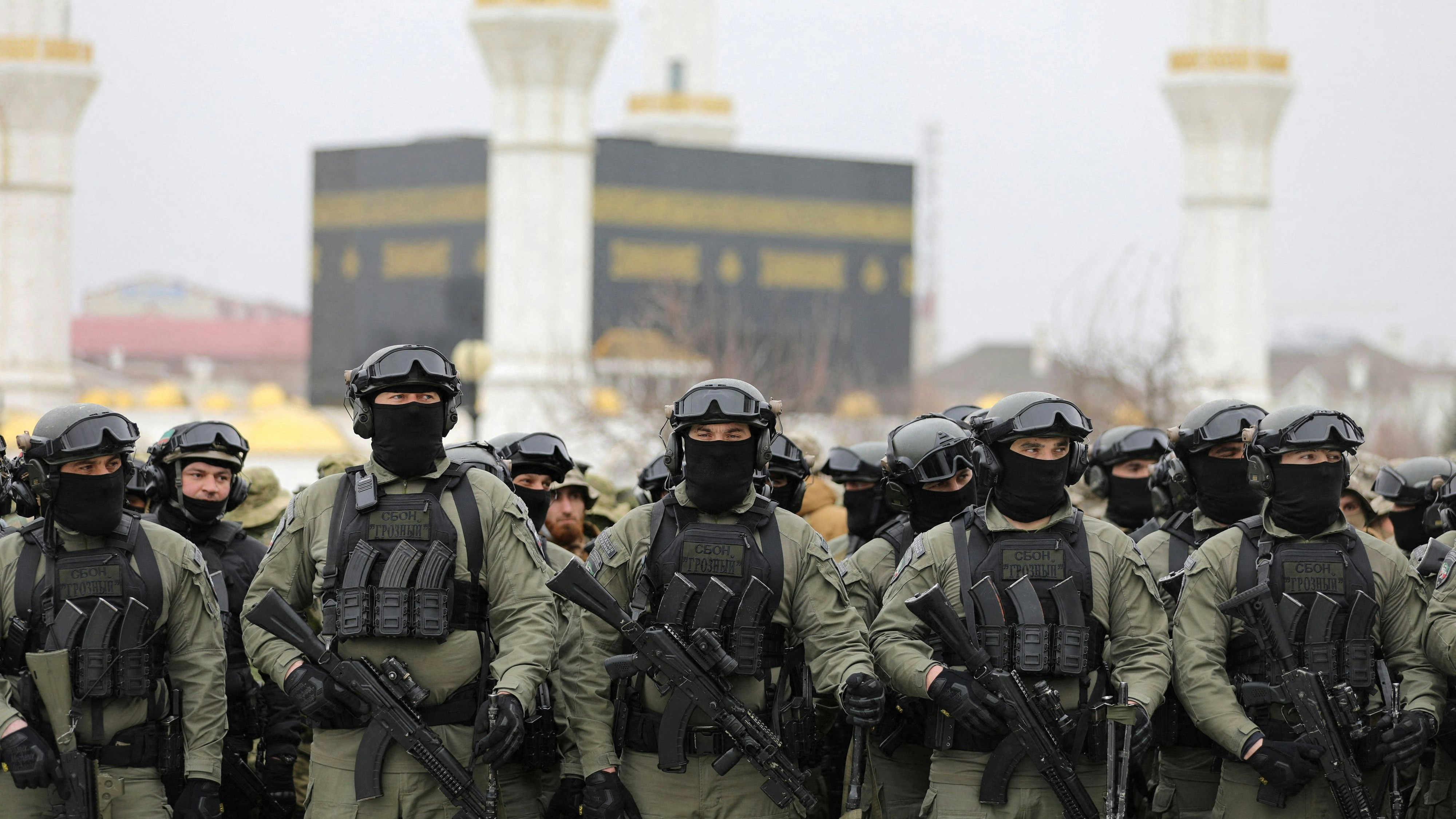 Service members gather in a square during head of the Chechen Republic Ramzan Kadyrov's address, dedicated to a military conflict in Ukraine, in Grozny, Russia February 25, 2022. REUTERS/Chingis Kondarov NO RESALES. NO ARCHIVES