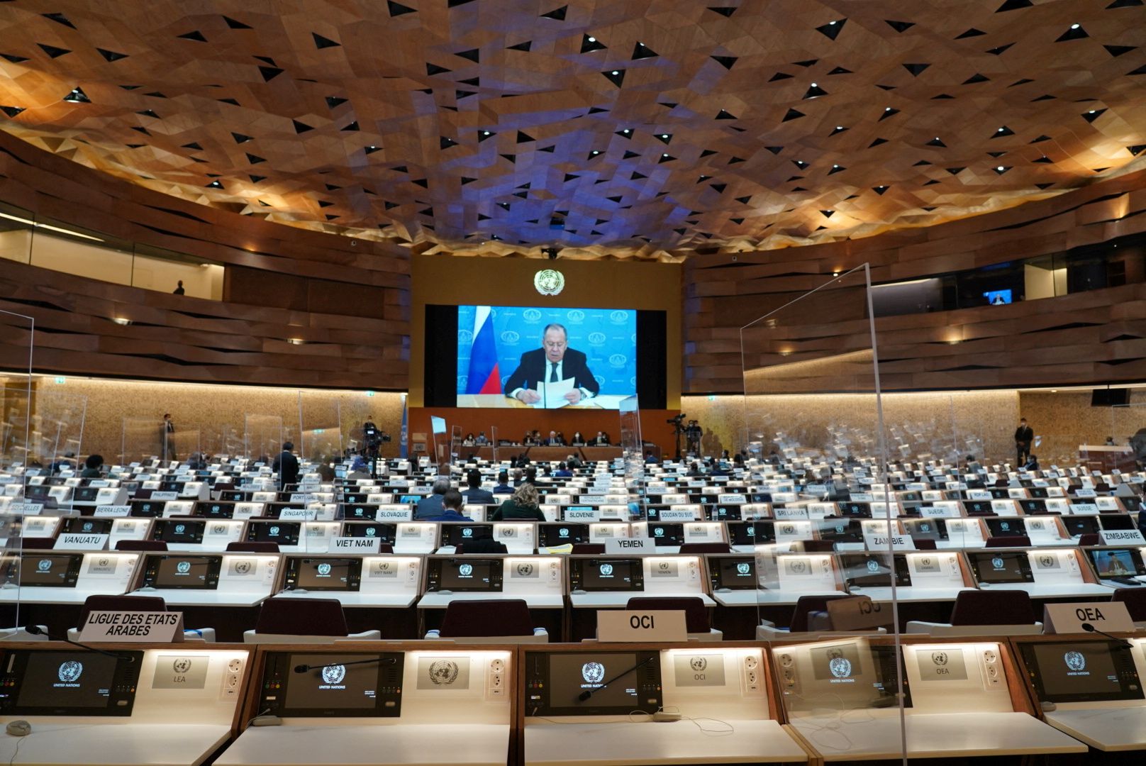 Russian Foreign Minister Sergei Lavrov's pre-recorded video message is played to a near-empty hall, after a walkout in protest of Russia's invasion of Ukraine, at the 49th session of the UN Human Rights Council at UN's European headquarters in Geneva, Switzerland March 1, 2022, in this picture obtained from social media.  Kristoffer Jonsson via REUTERS  THIS IMAGE HAS BEEN SUPPLIED BY A THIRD PARTY. MANDATORY CREDIT. NO RESALES. NO ARCHIVES.