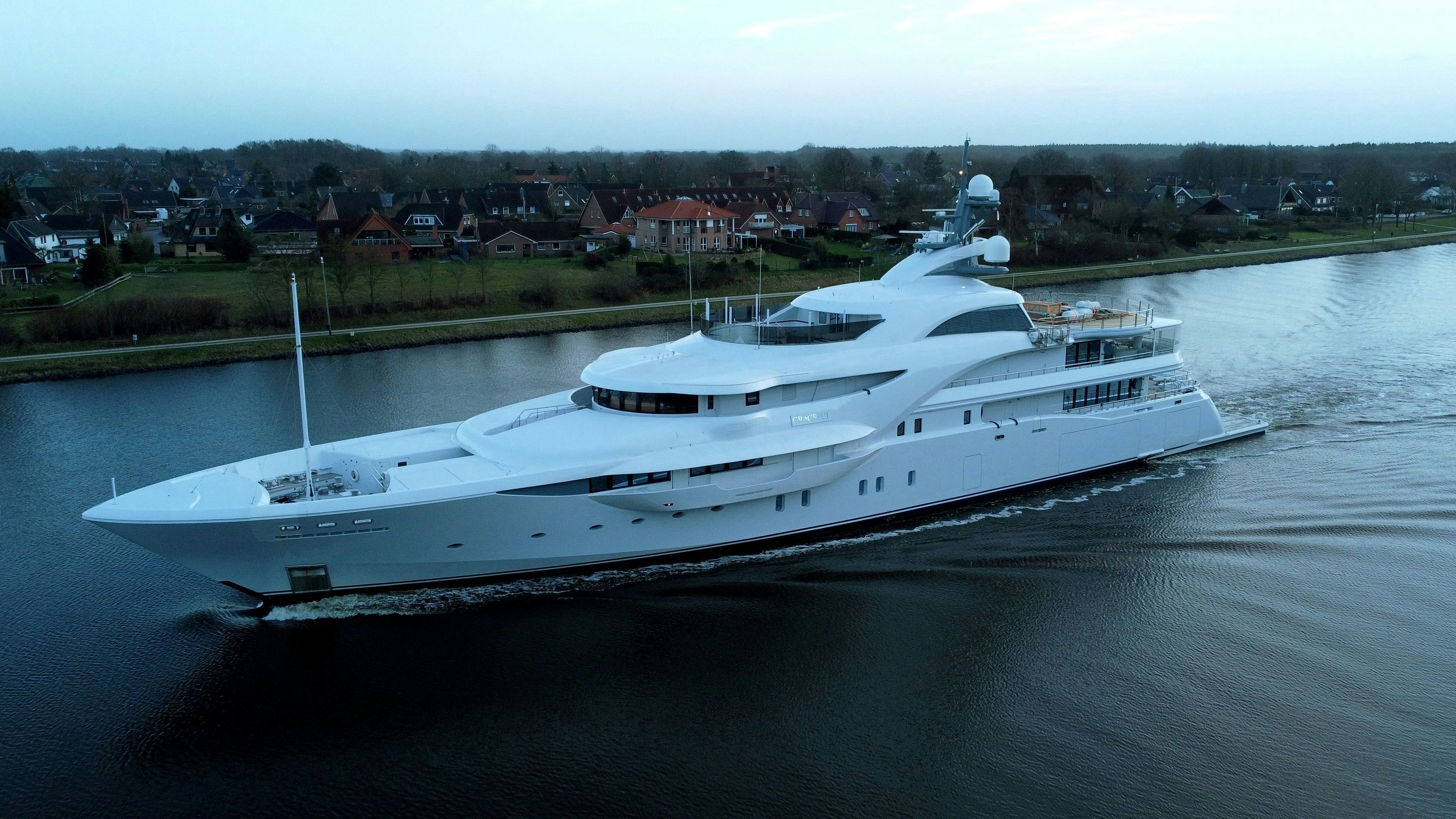 The yacht "Graceful" sails along the Kiel Canal (Nord Ostsee Kanal) near Rendsburg, north of Hamburg, Germany, February 7, 2022. Picture taken February 7, 2022. Picture taken with a drone. REUTERS/Steffen Mayer